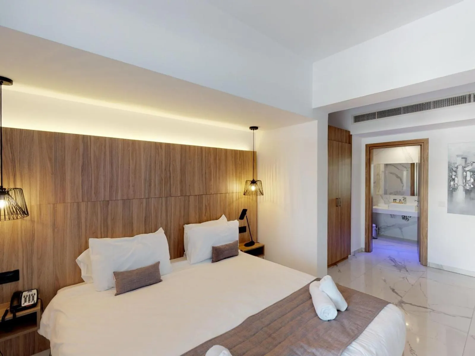 Bedroom, Bed in The Blue Ivy Hotel & Suites