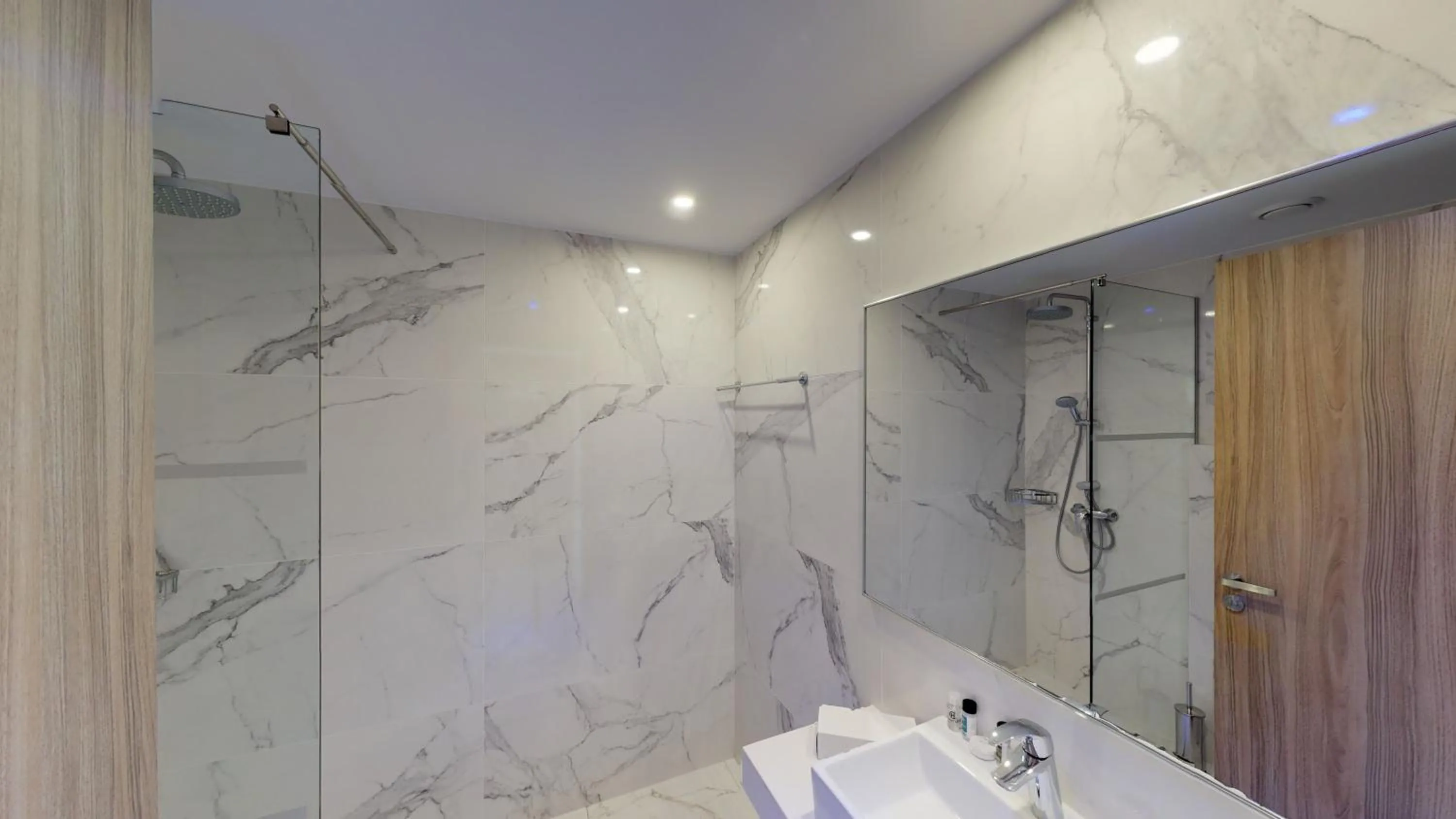 Bathroom in The Blue Ivy Hotel & Suites