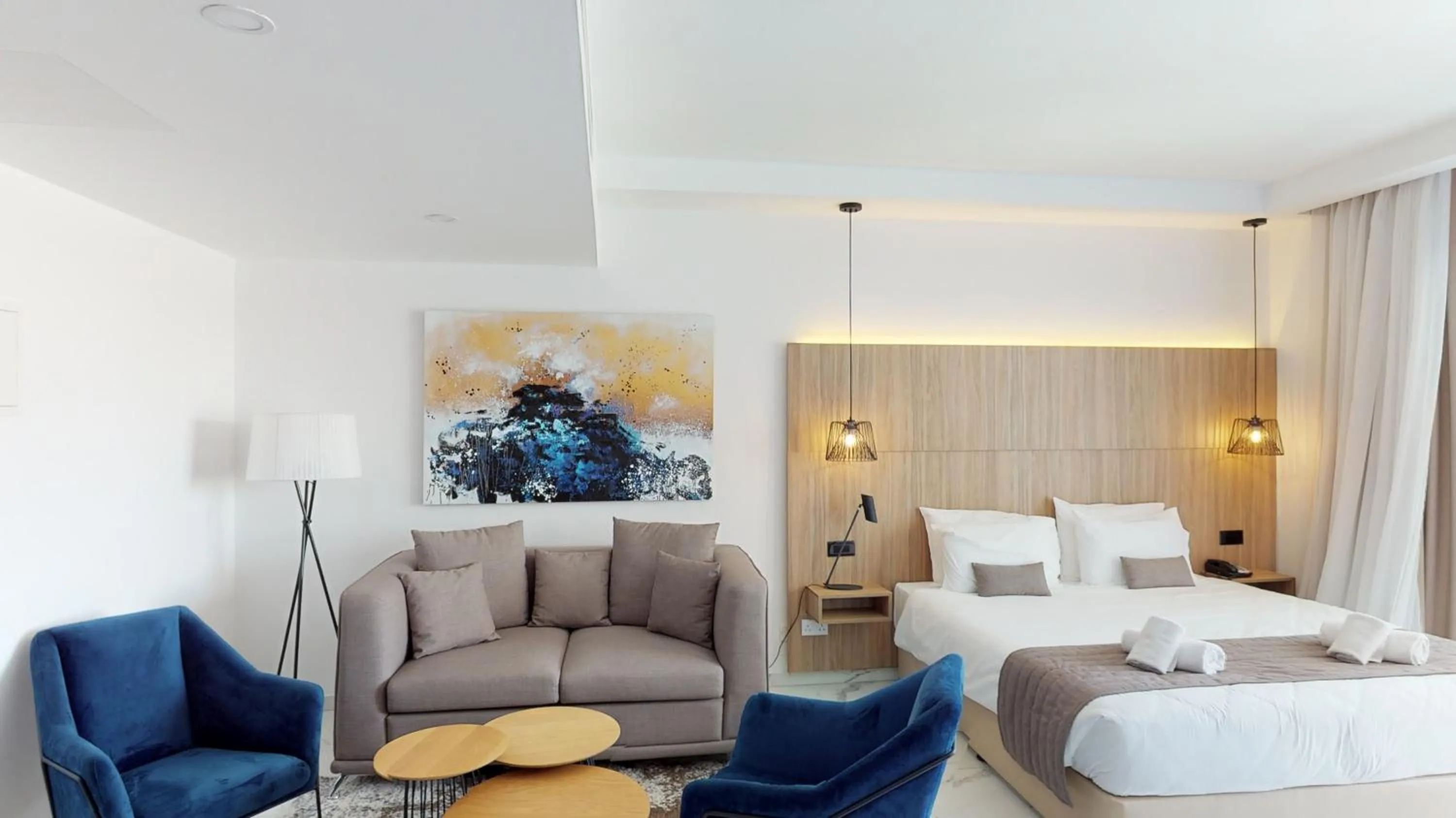 Bedroom, Bed in The Blue Ivy Hotel & Suites