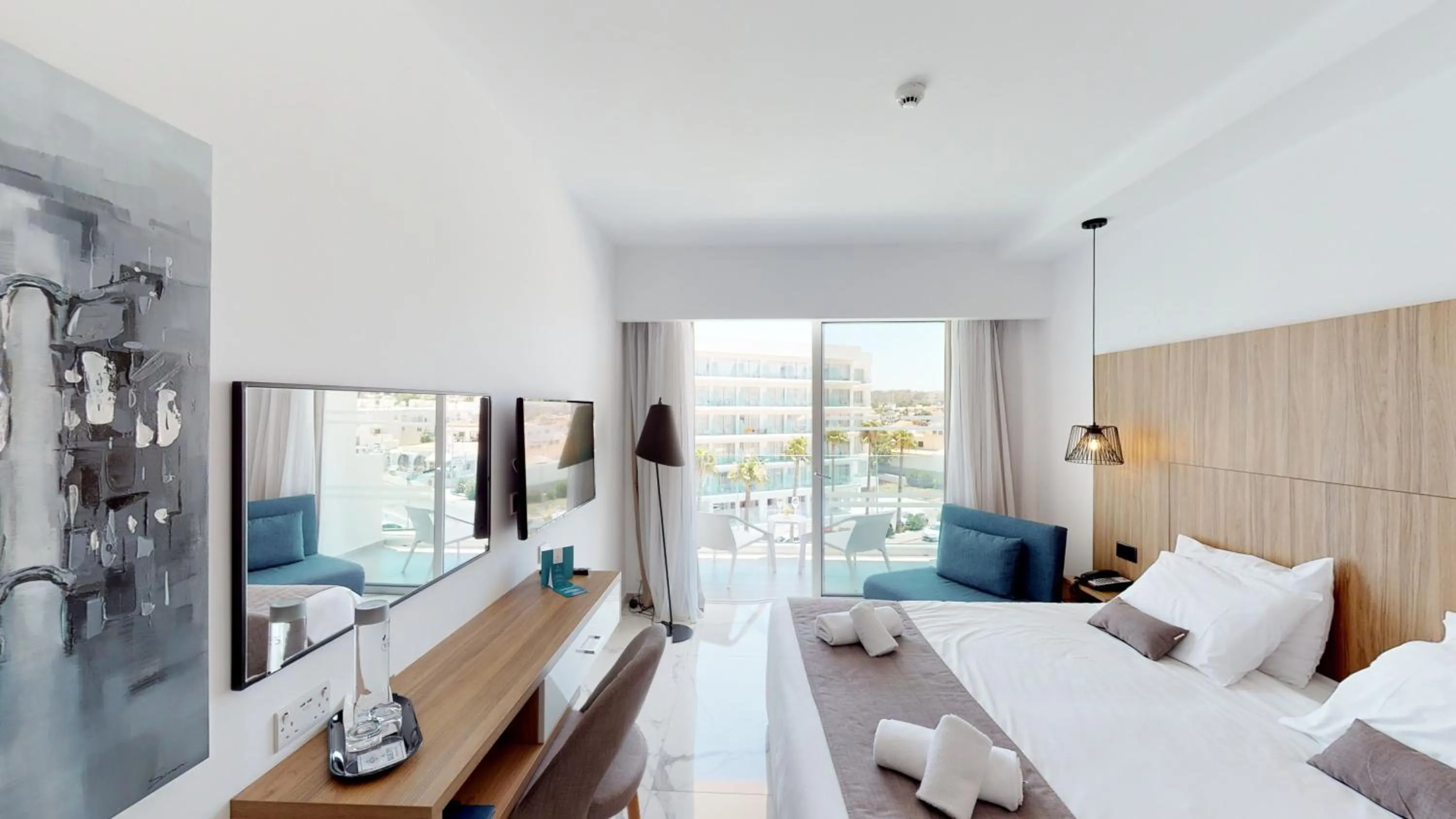 Bedroom, Bed in The Blue Ivy Hotel & Suites