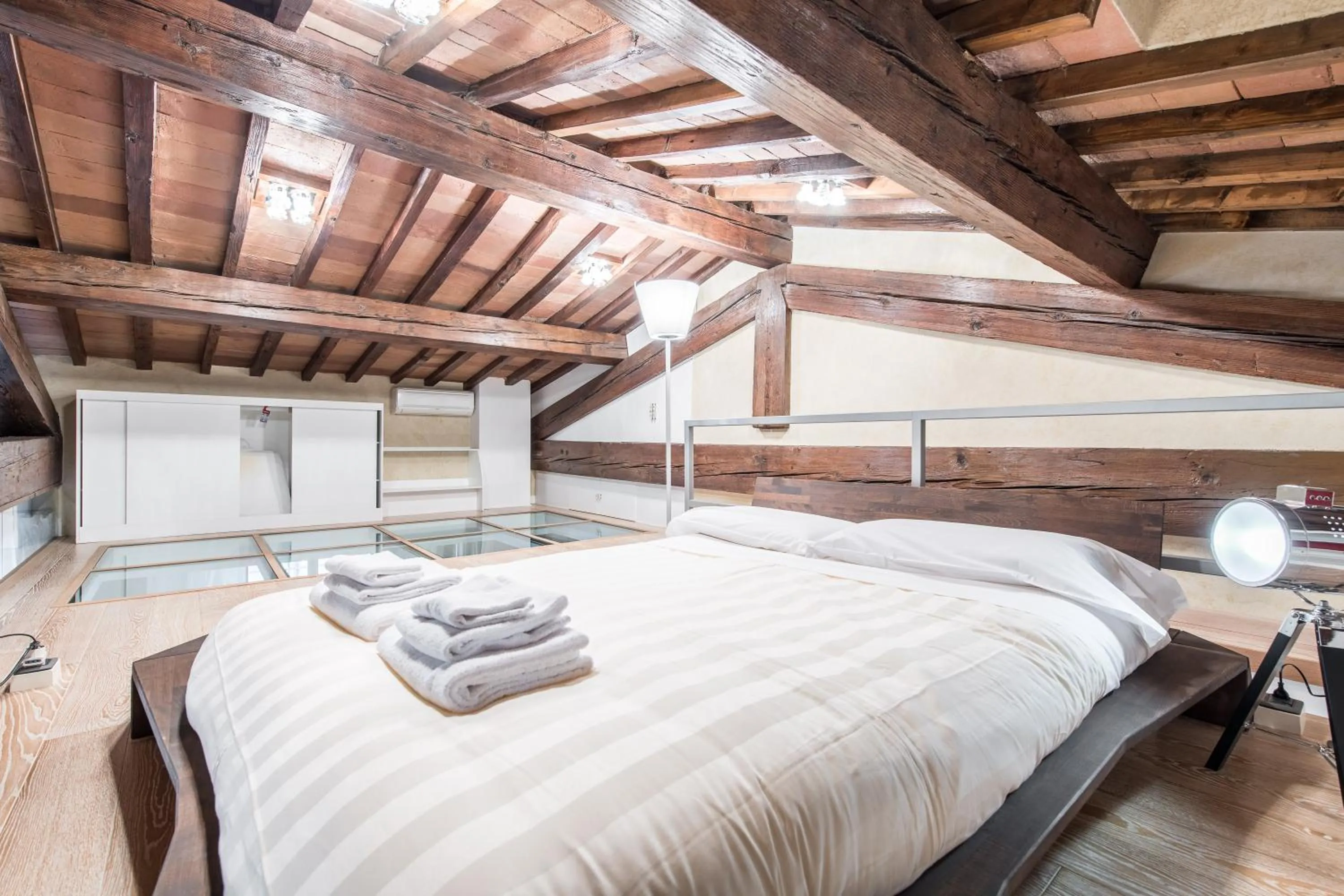 Bed in Duomo Luxury Loft by Mmega