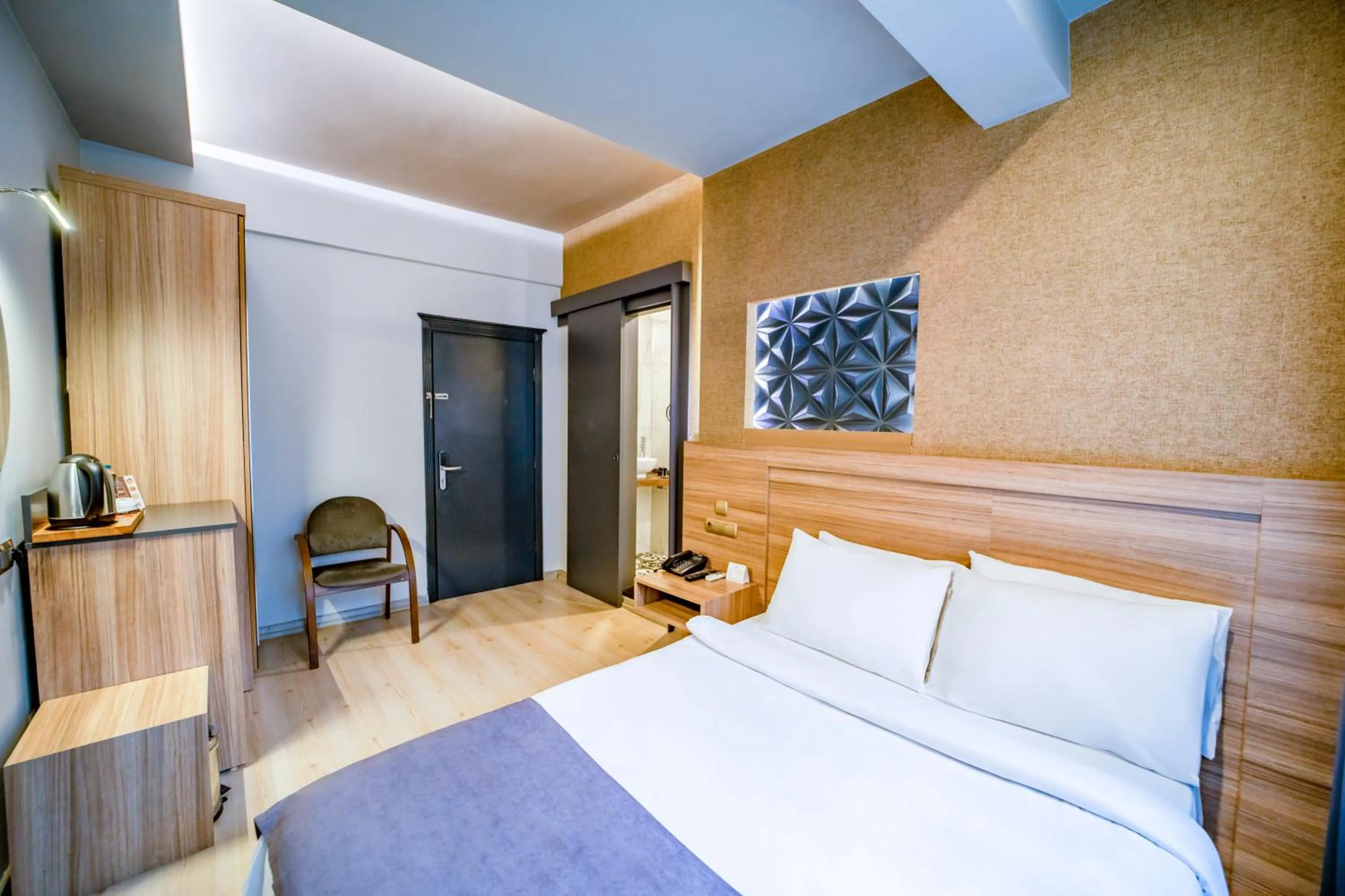 Bed in Aksular Hotel