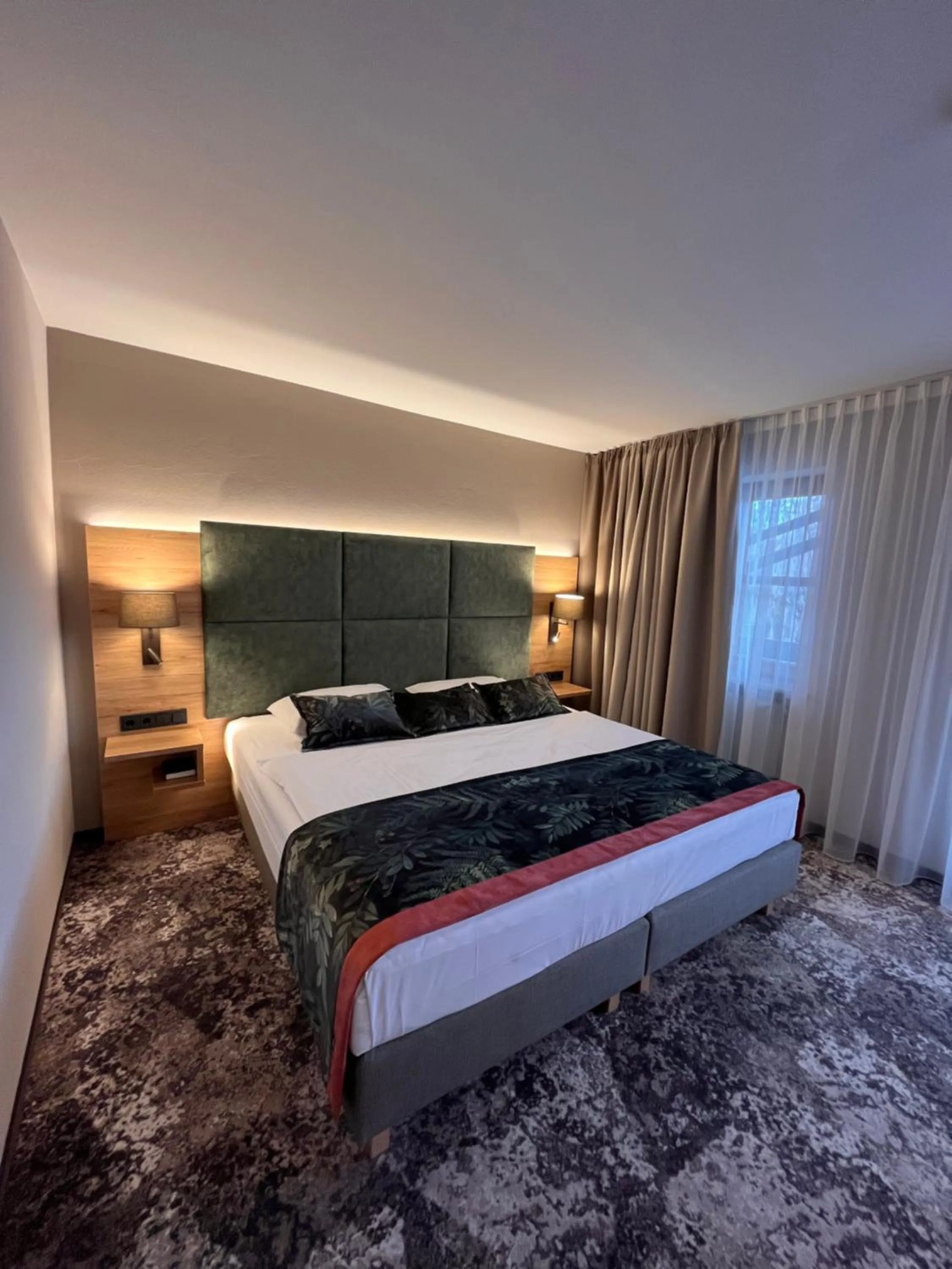 Bed in Appartment-Hotel-Hölzl