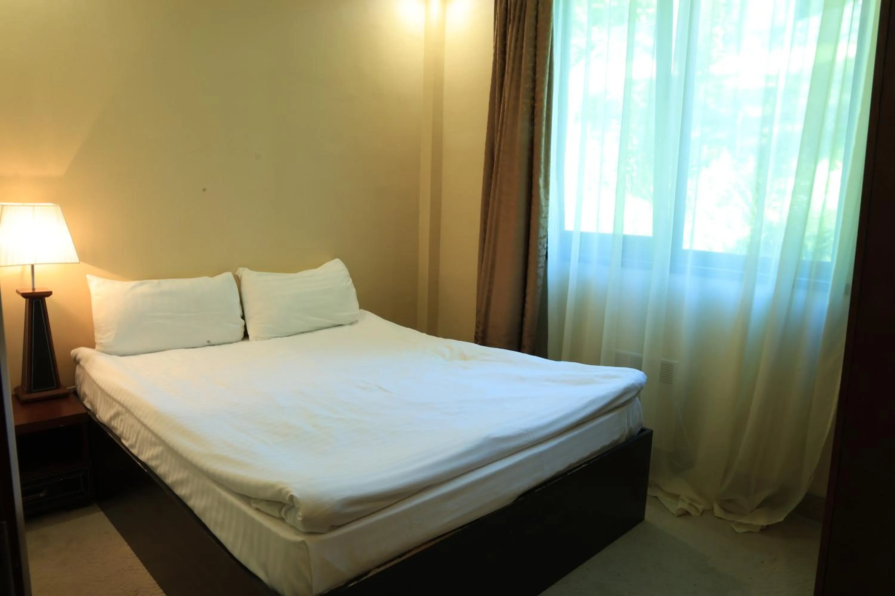 Bed in Dilijan Park Resort & Villas