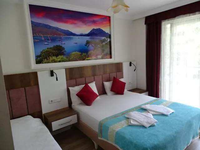 Bed in Arikanda River Garden Hotel