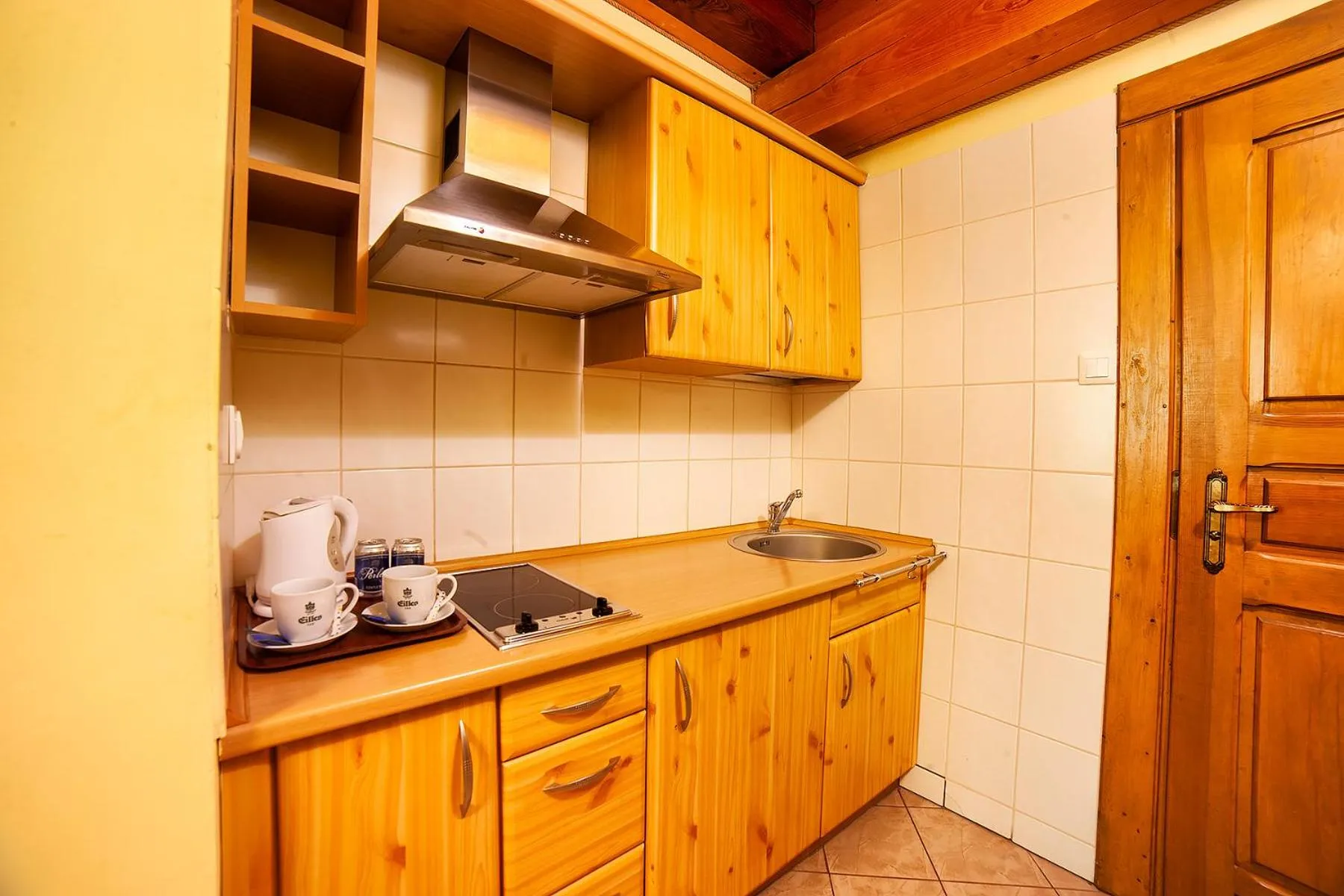 Kitchen or kitchenette in Hotel Dworek Wapionka