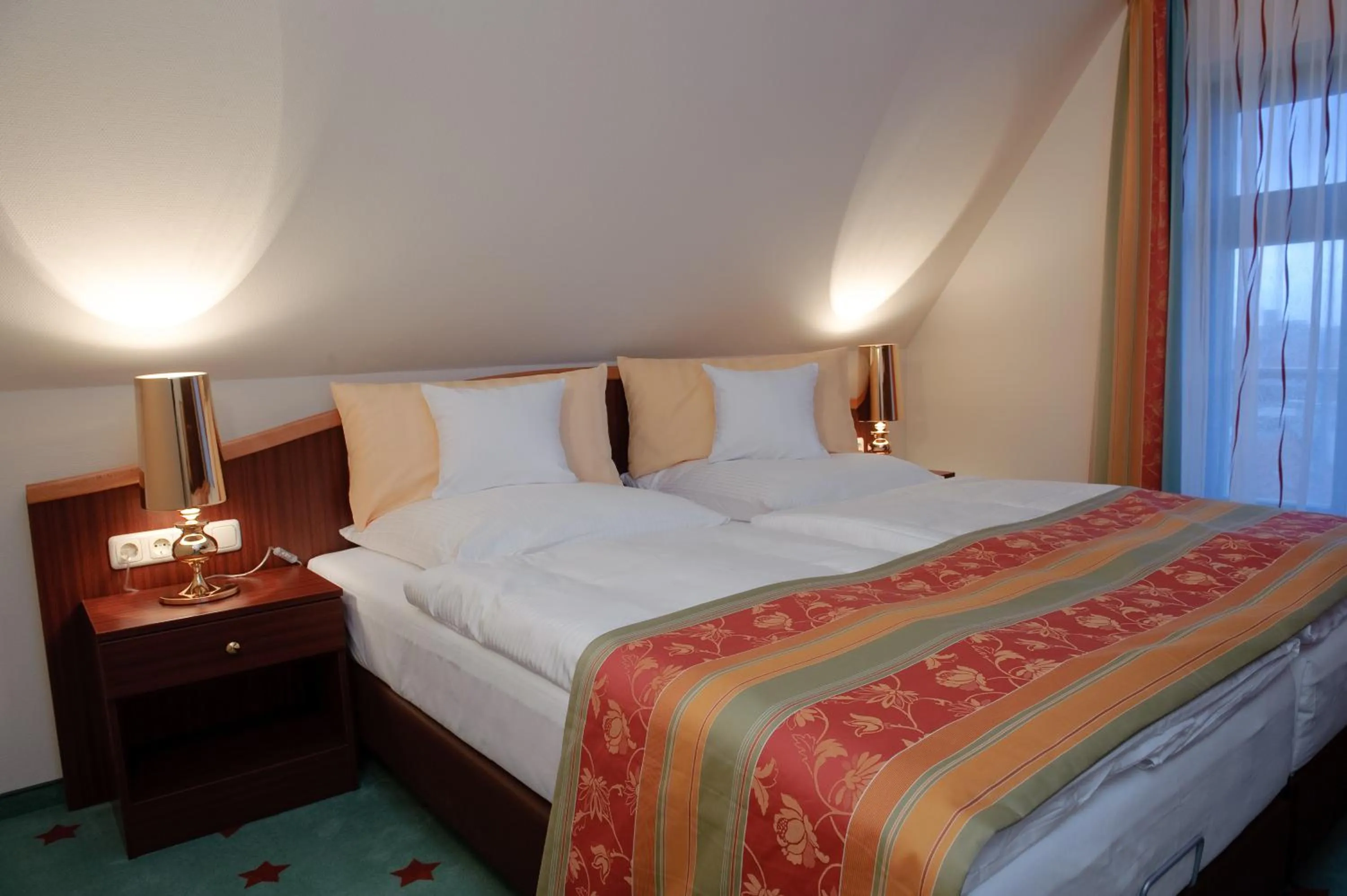 Photo of the whole room, Bed in Stadthotel Stern