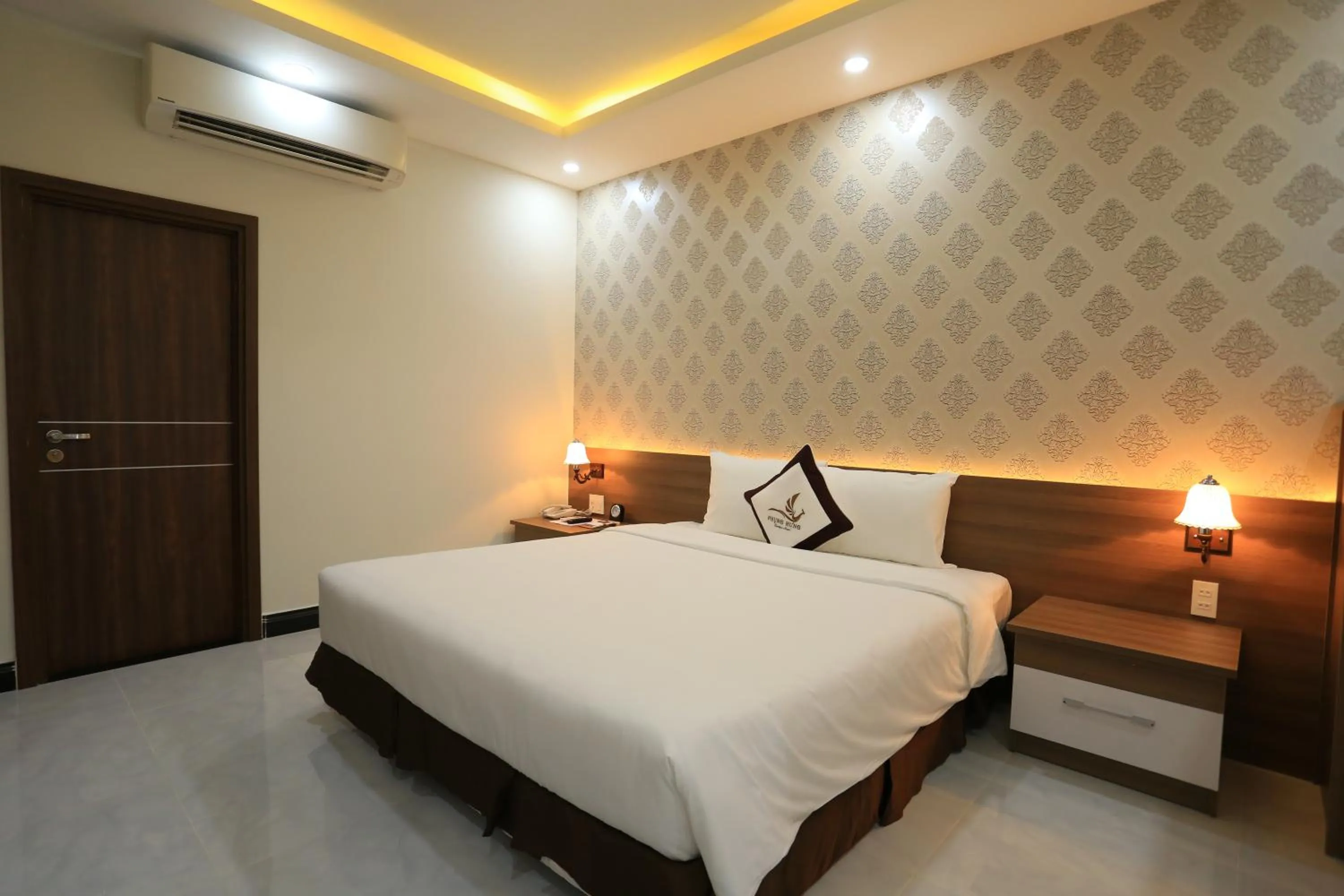 Bed in Phung Hung Boutique Hotel