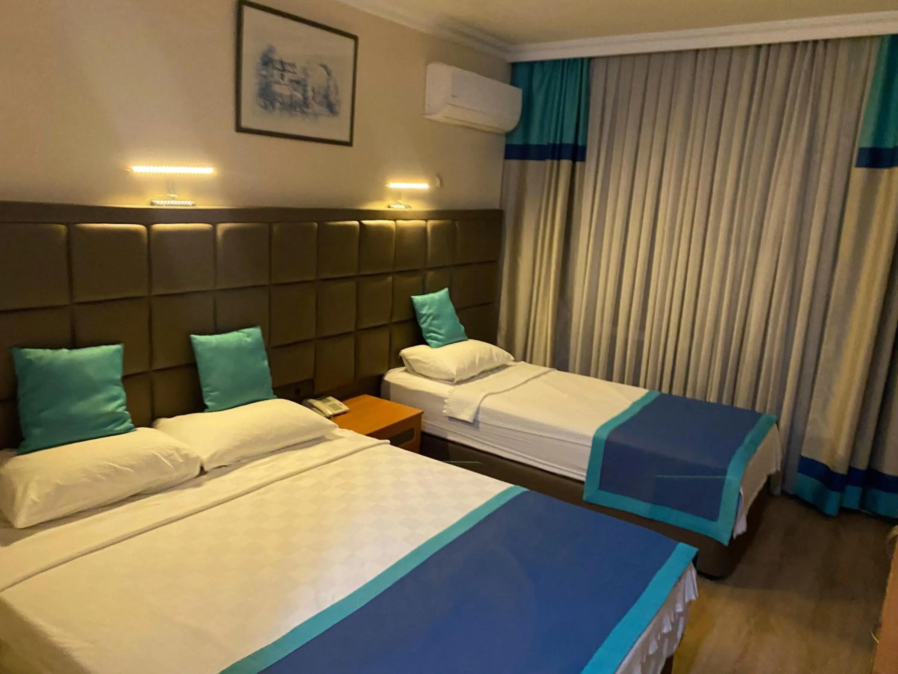 Photo of the whole room, Bed in Prima Hotel