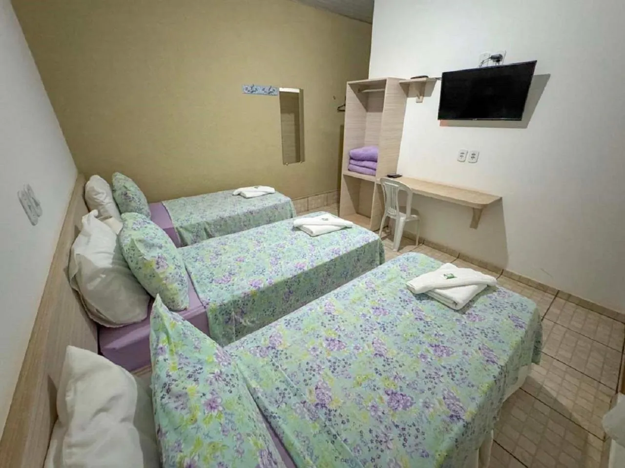 Property building, Bed in Pousada Jubaia