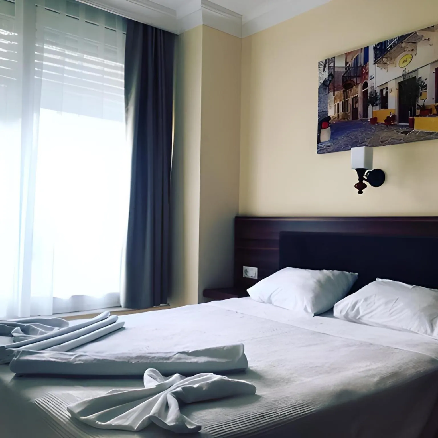 Bed in Minta Apart Hotel