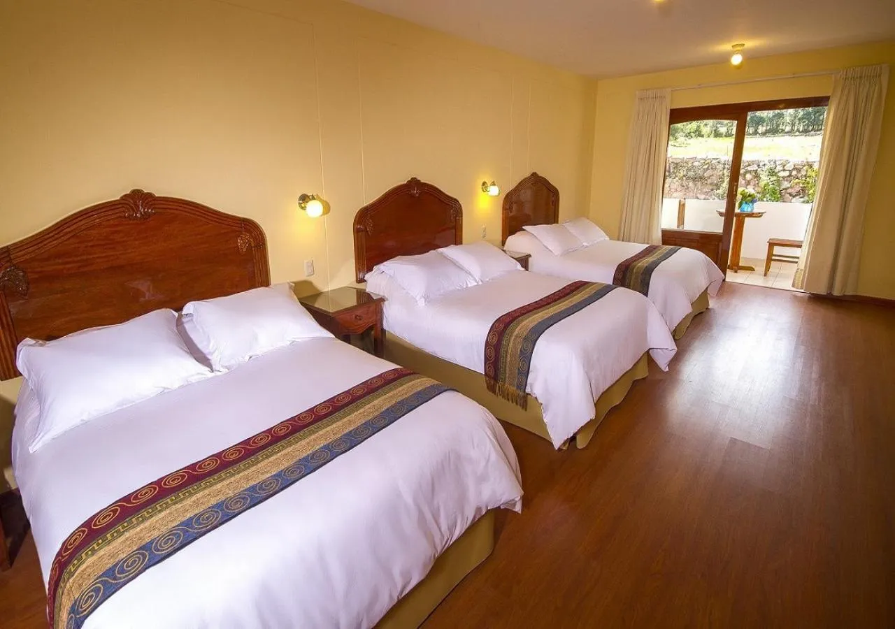 Bed in Hotel Agustos Urubamba