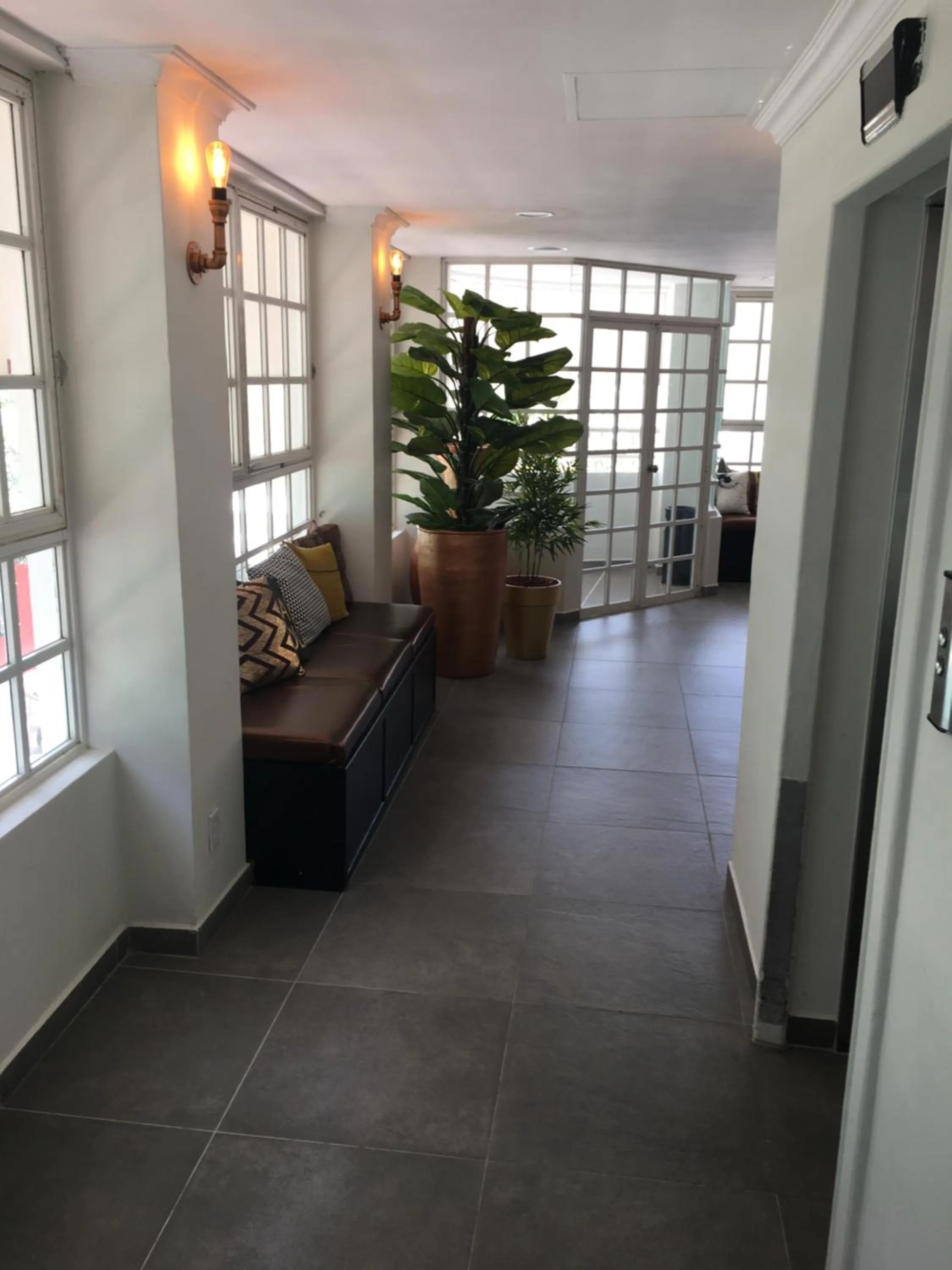 Communal lounge/ TV room in San Marco Hotel Curacao & Casino