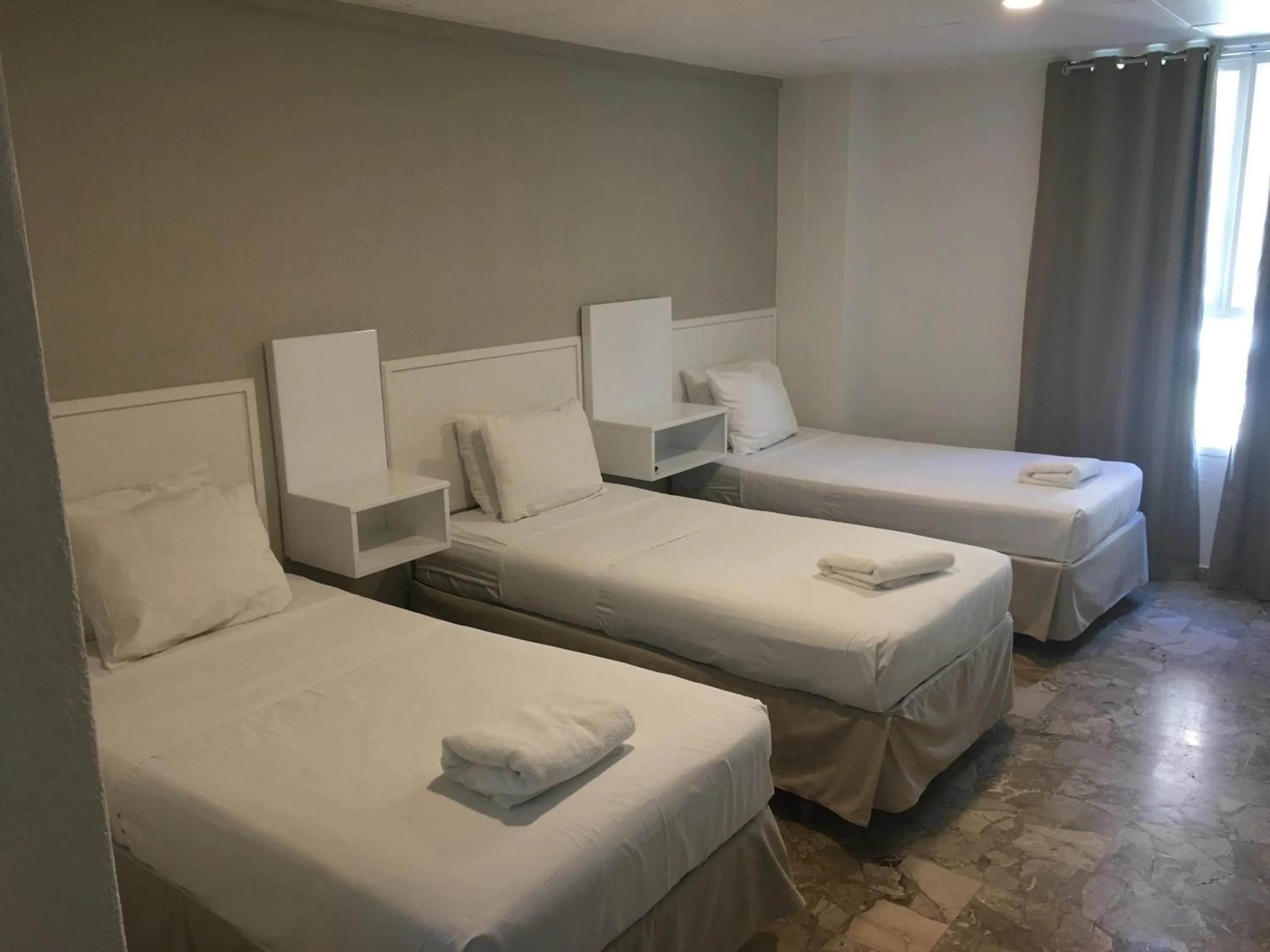 Bed in San Marco Hotel Curacao & Casino