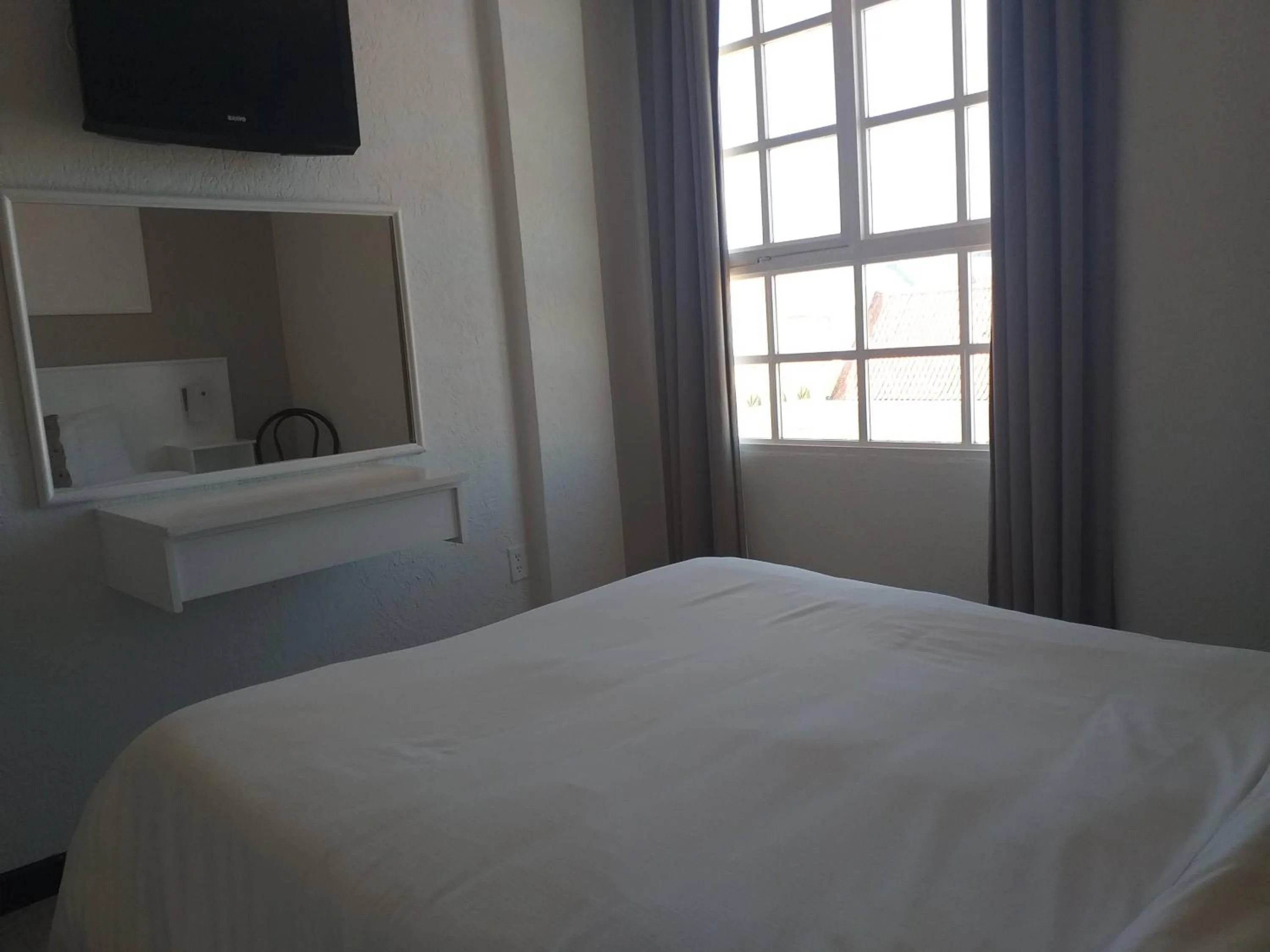 Bed in San Marco Hotel Curacao & Casino