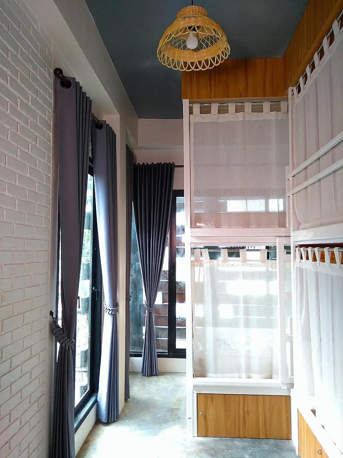 Bed in 8-Bed Mixed Dormitory Room in Baan Mai Kradan Hostel Chiang Rai Bed in 8-Bed Mixed Dormitory Room in Baan Mai Kradan Hostel Chiang Rai