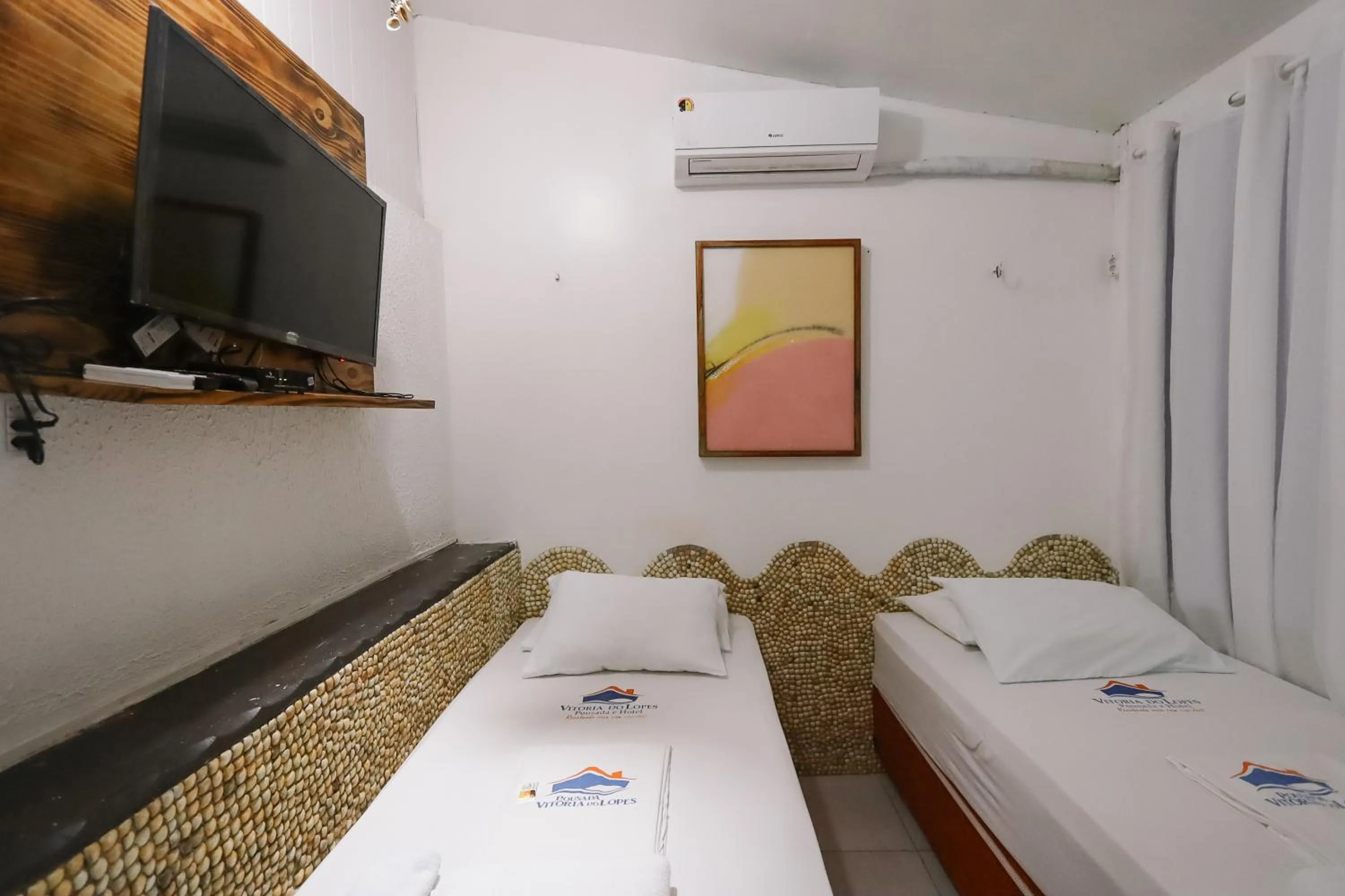 Bed in Pousada Vitória do Lopes