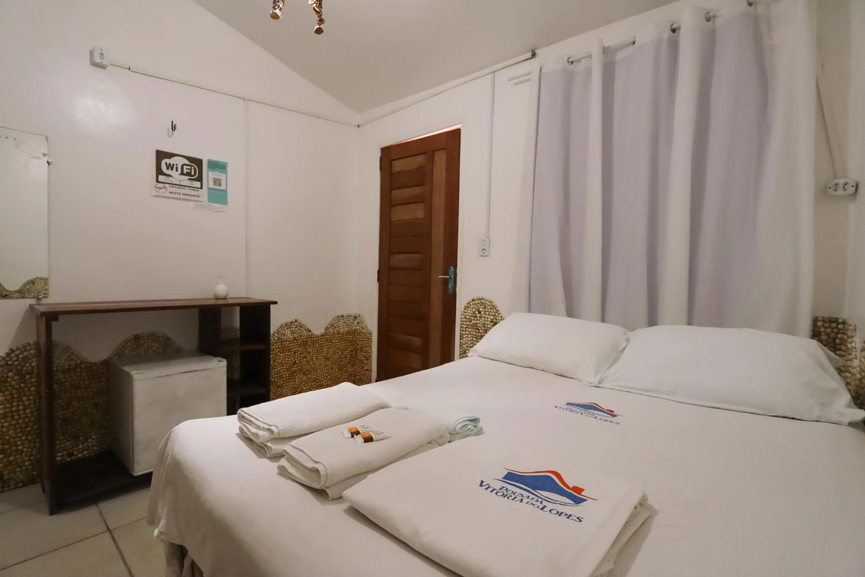 Bed in Pousada Vitória do Lopes