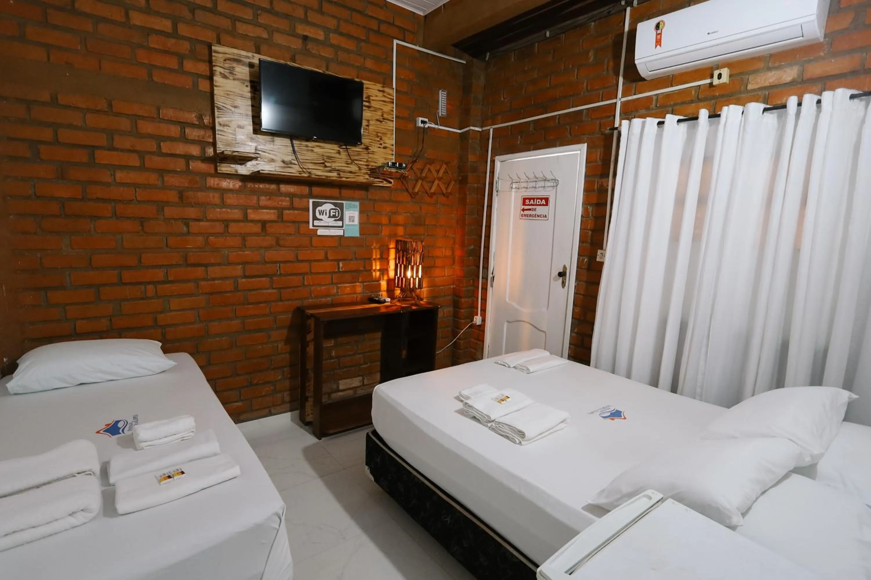 Bed in Pousada Vitória do Lopes