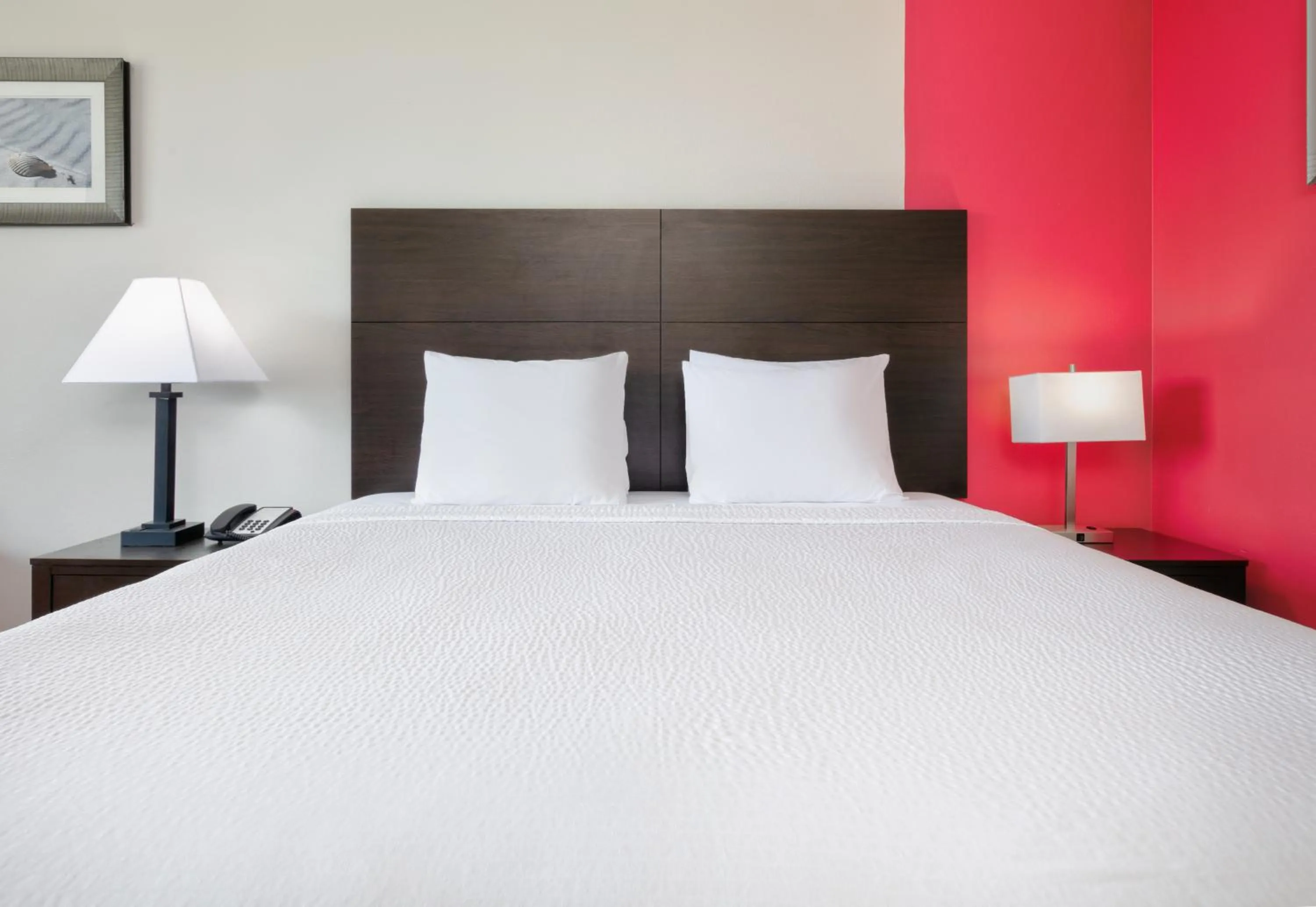 Bed in Ramada by Wyndham Diamondhead I-10 Gulfport