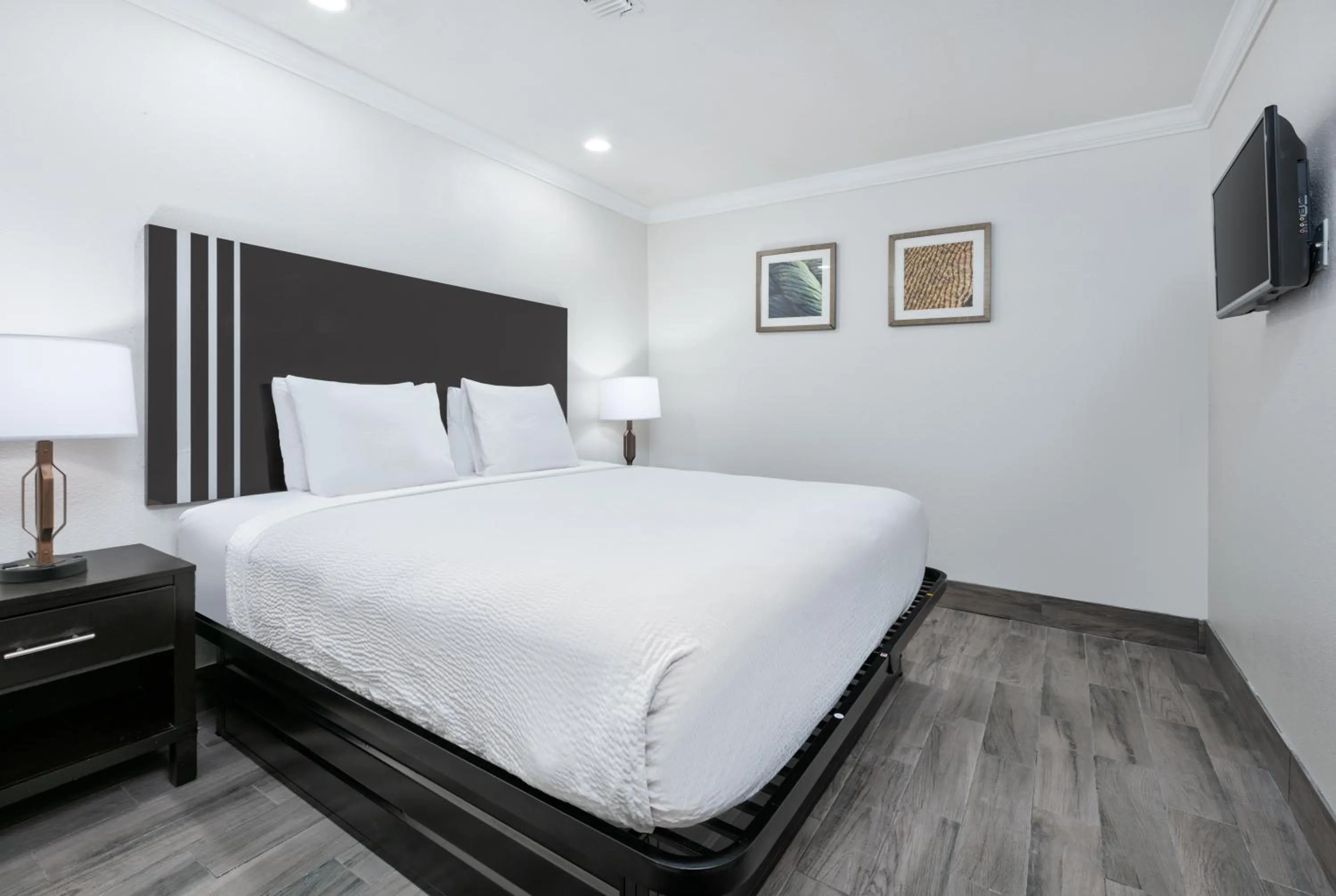 Bed in Ramada by Wyndham Diamondhead I-10 Gulfport