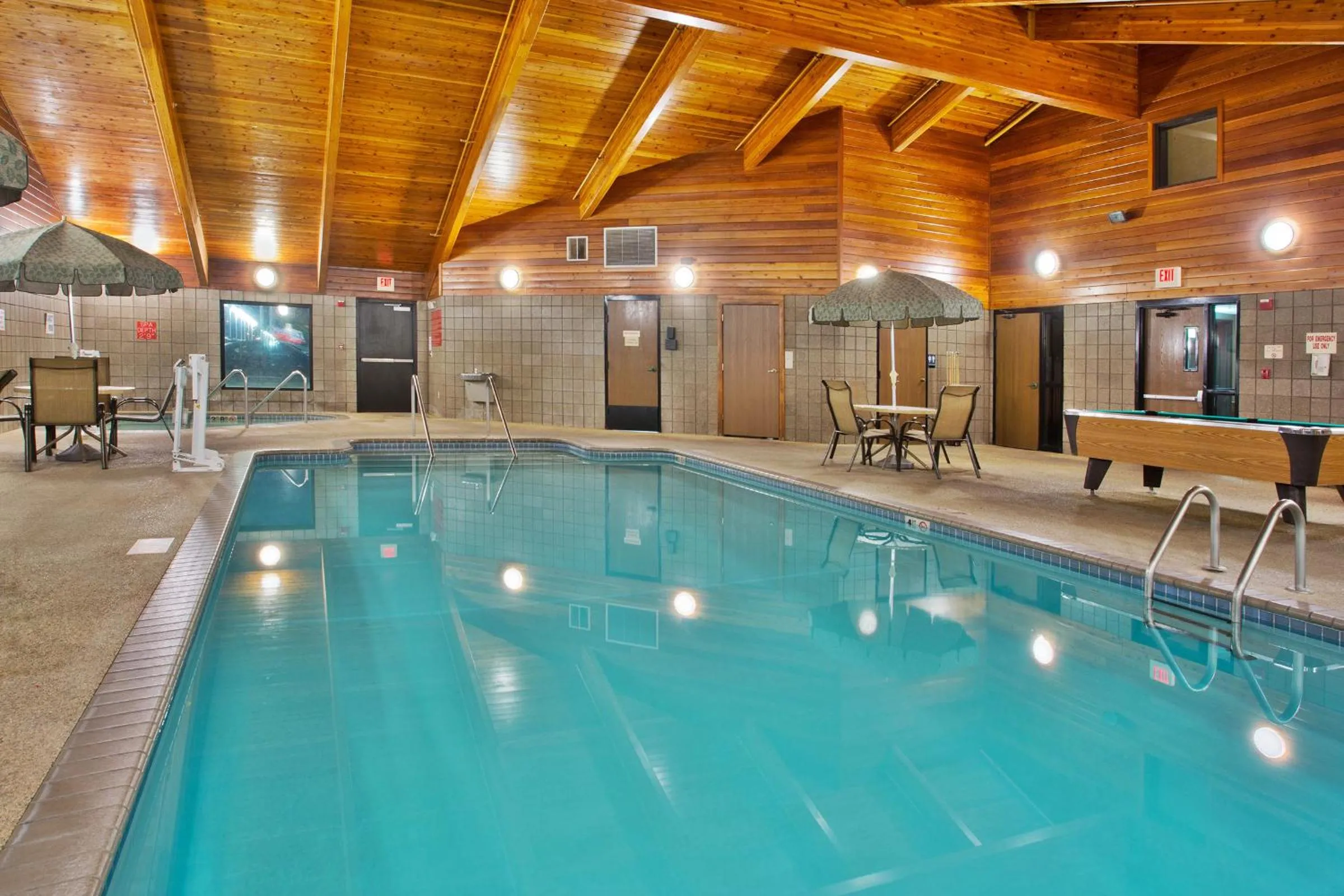 Swimming pool in AmericInn by Wyndham Lincoln North