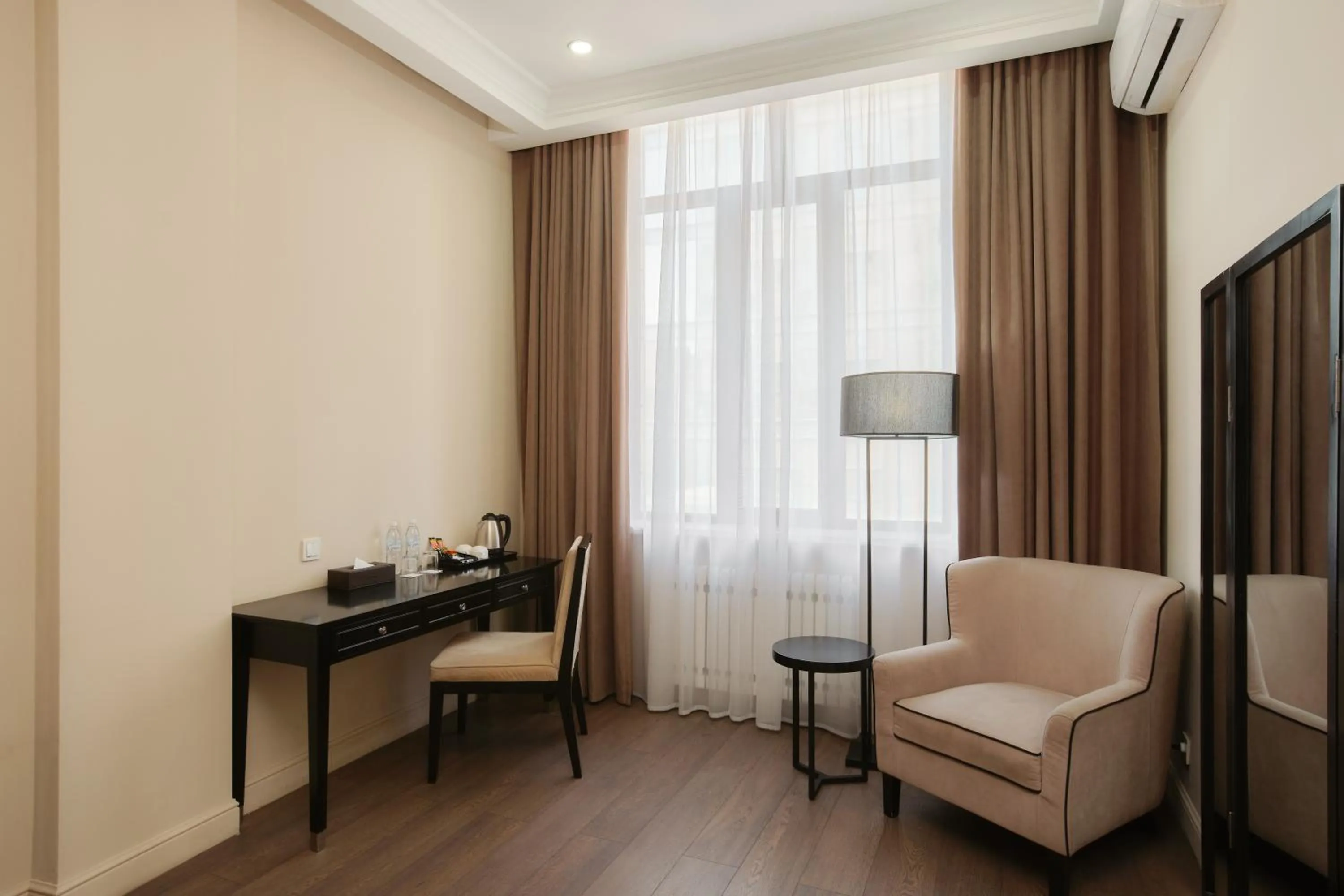 Seating area in Madison Ave Hotel Bishkek