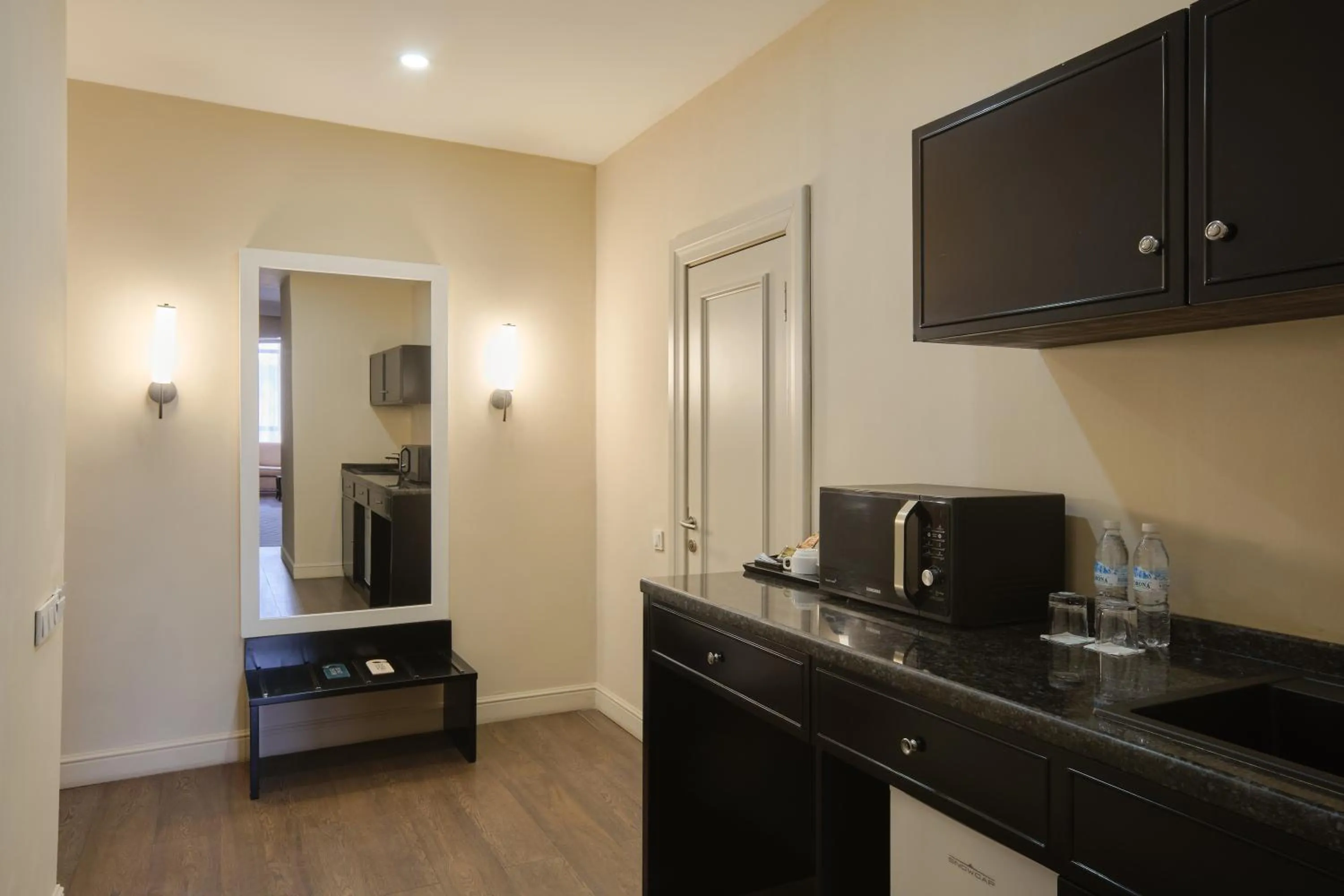 Kitchen or kitchenette in Madison Ave Hotel Bishkek