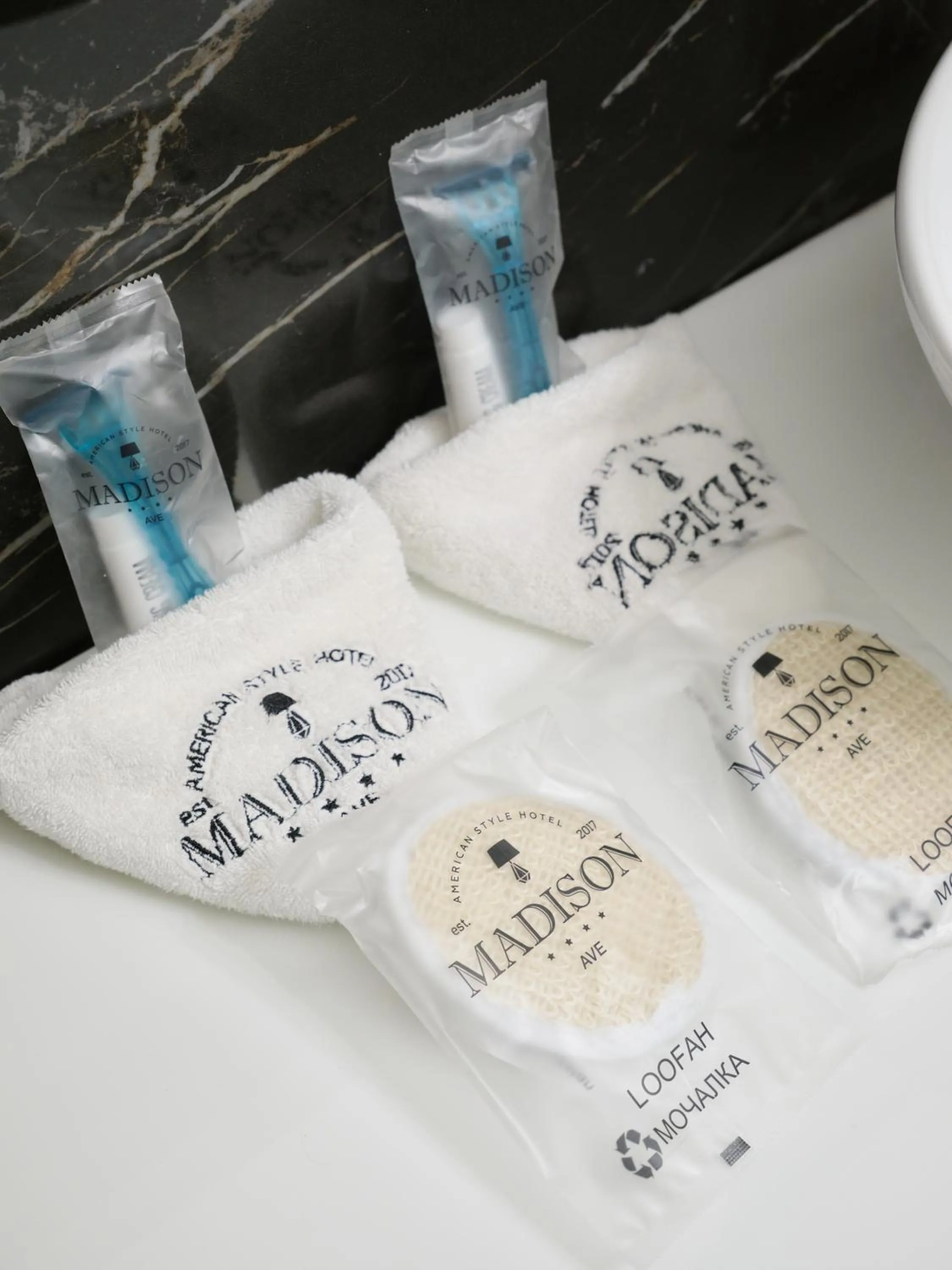 Logo/Certificate/Sign in Madison Ave Hotel Bishkek