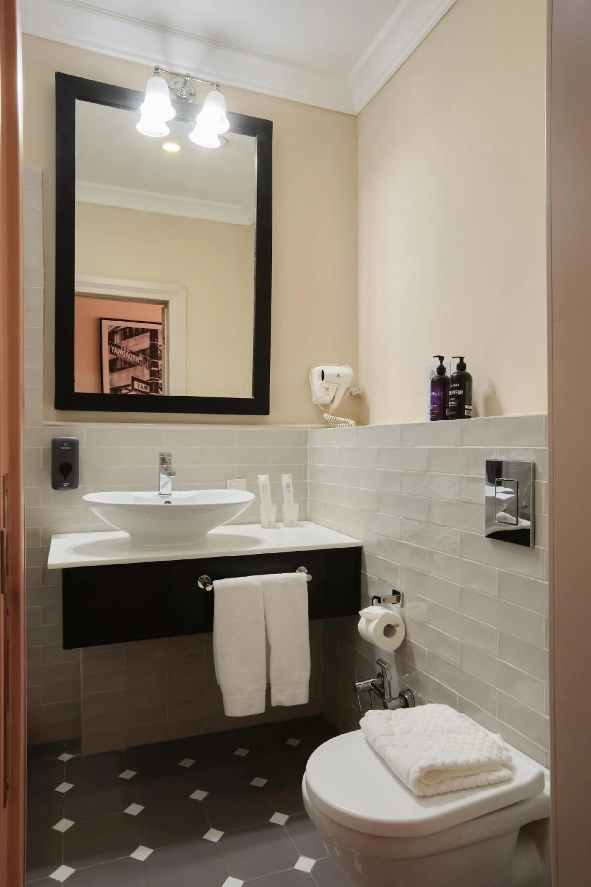 Toilet in Madison Ave Hotel Bishkek