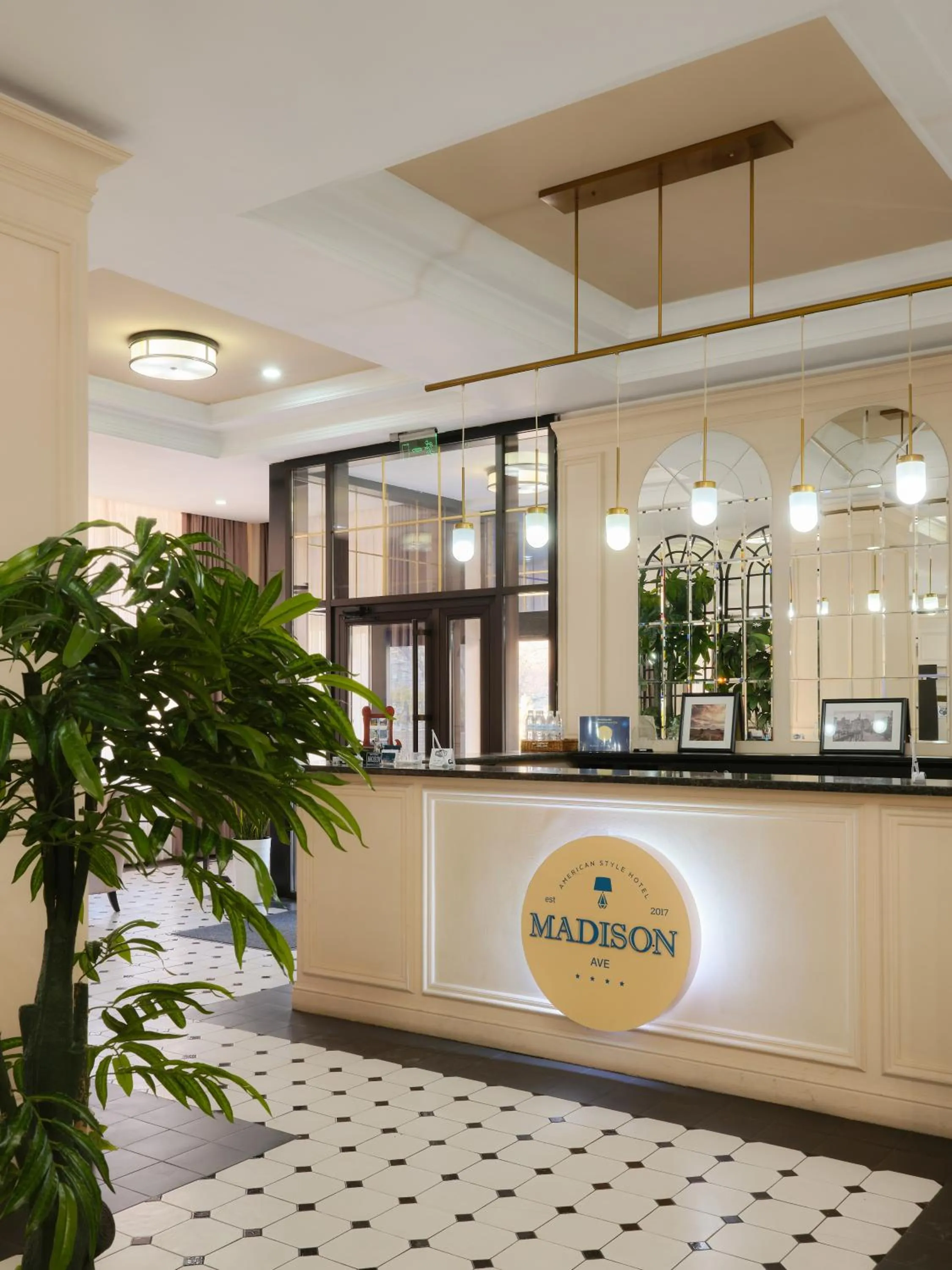 Property logo or sign in Madison Ave Hotel Bishkek