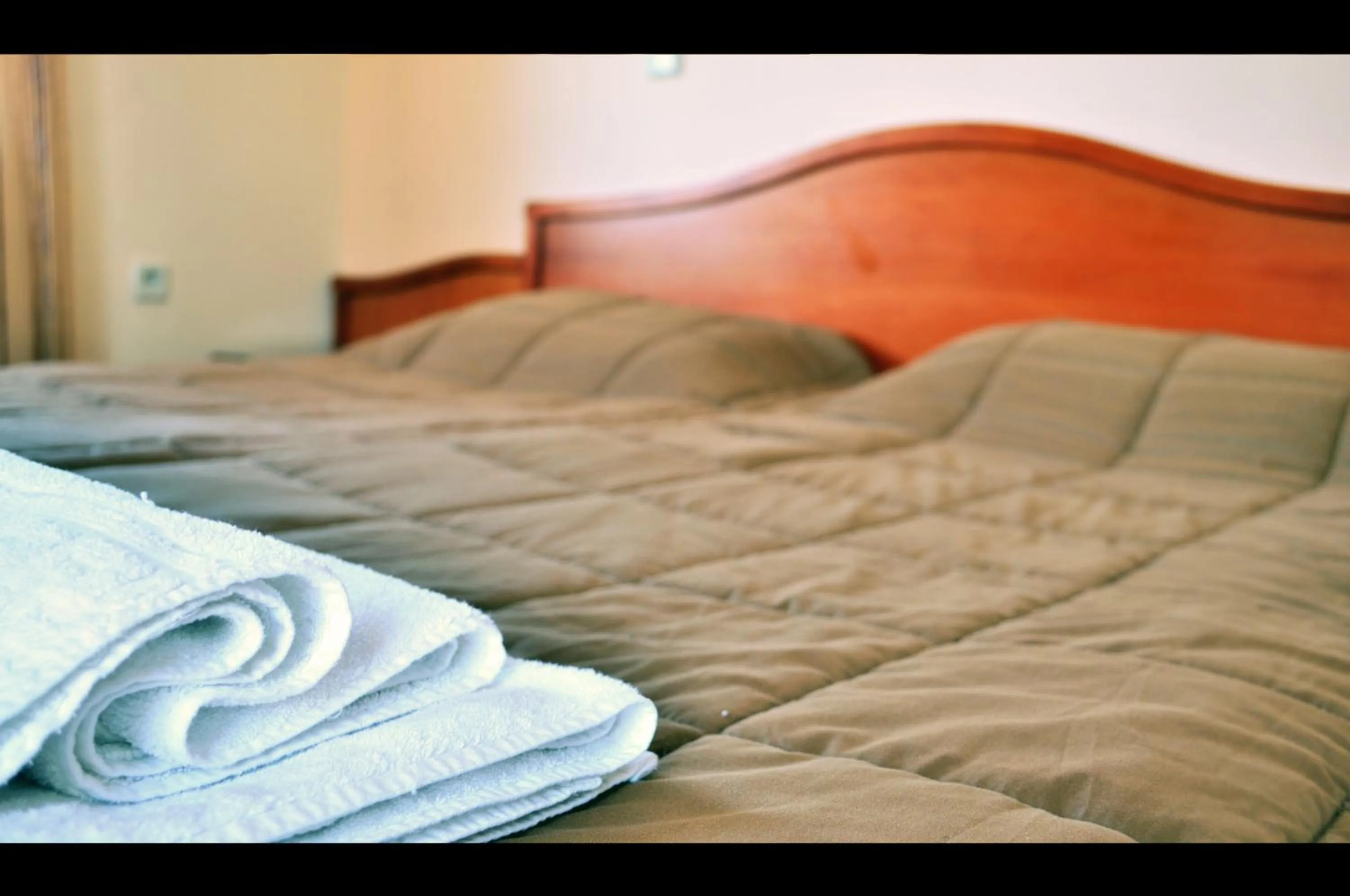 Bed in Lakonia Hotel