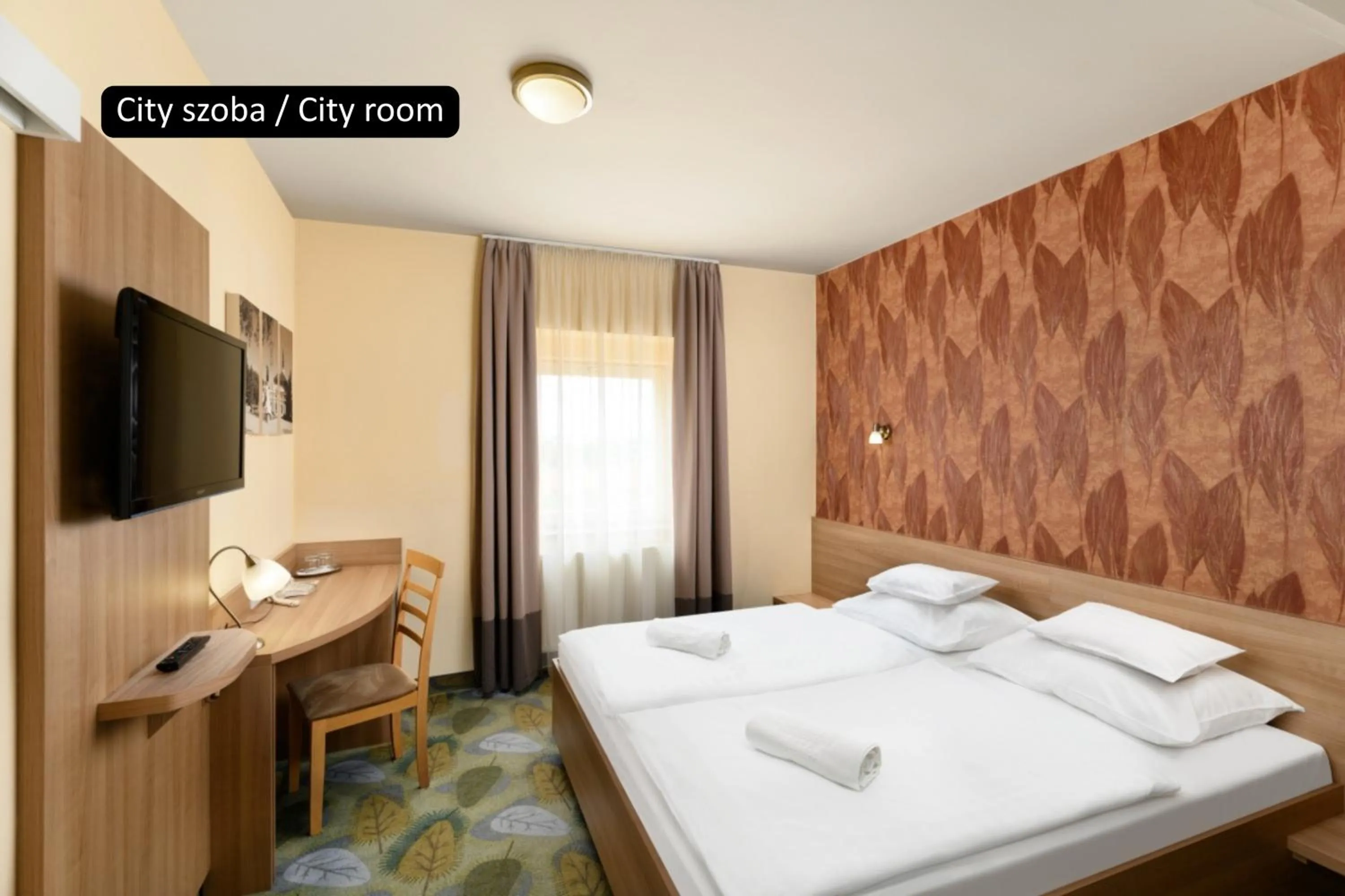 Bed in Aranyhomok Hotel Business & Relax