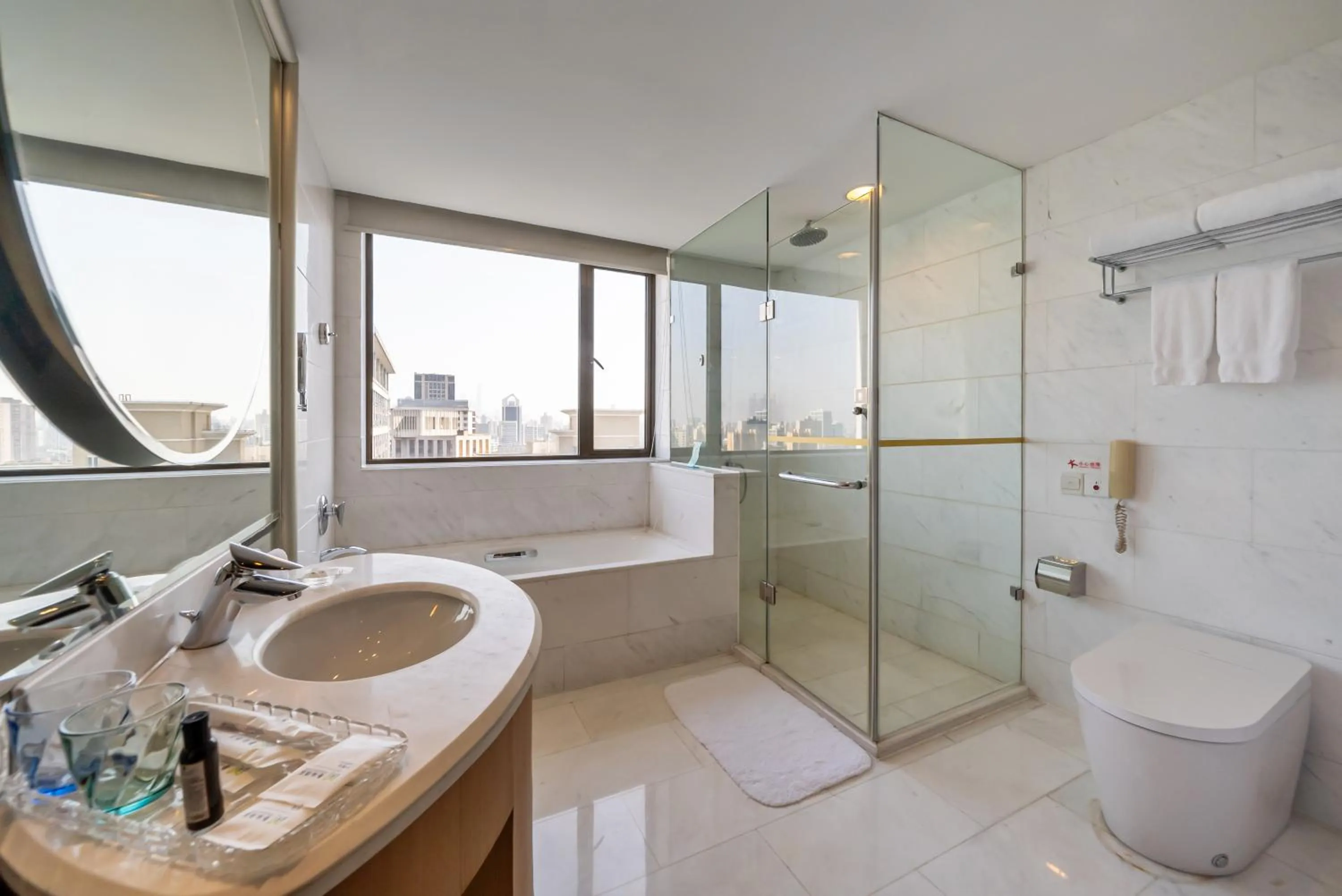 Toilet in GuangDong Hotel Shanghai - Free Self-service Laundry