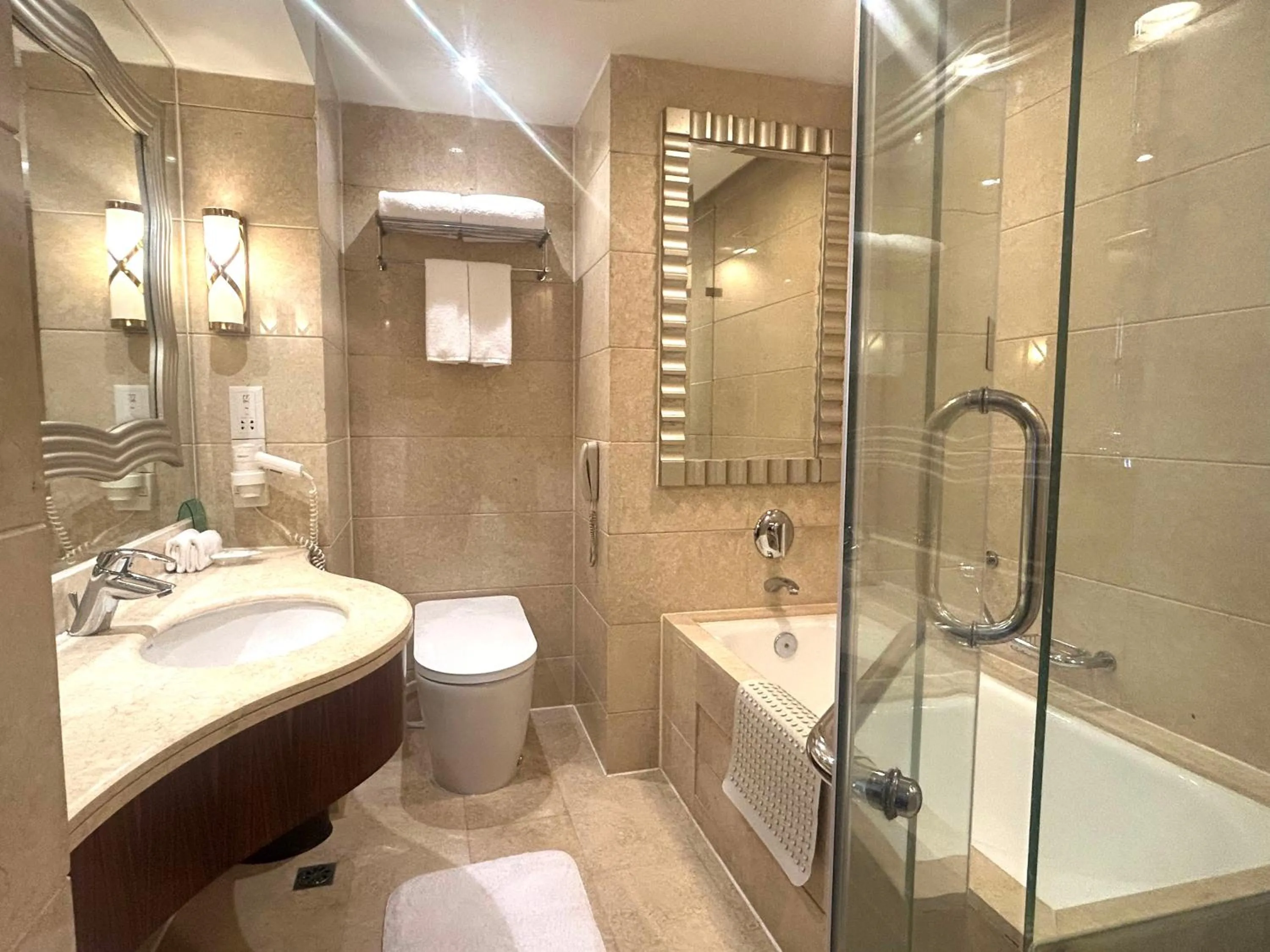 Toilet in GuangDong Hotel Shanghai - Free Self-service Laundry