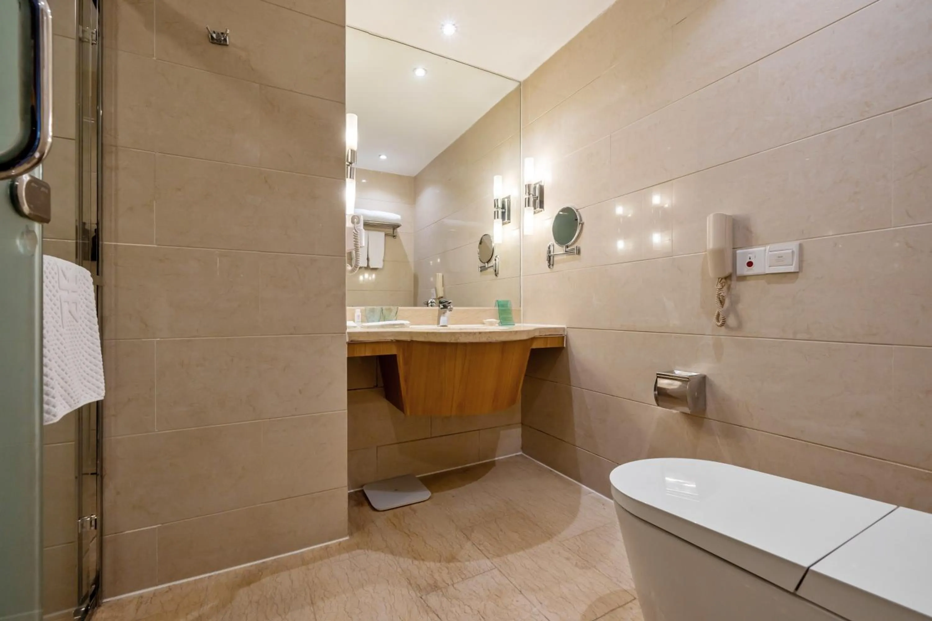 Toilet in GuangDong Hotel Shanghai - Free Self-service Laundry