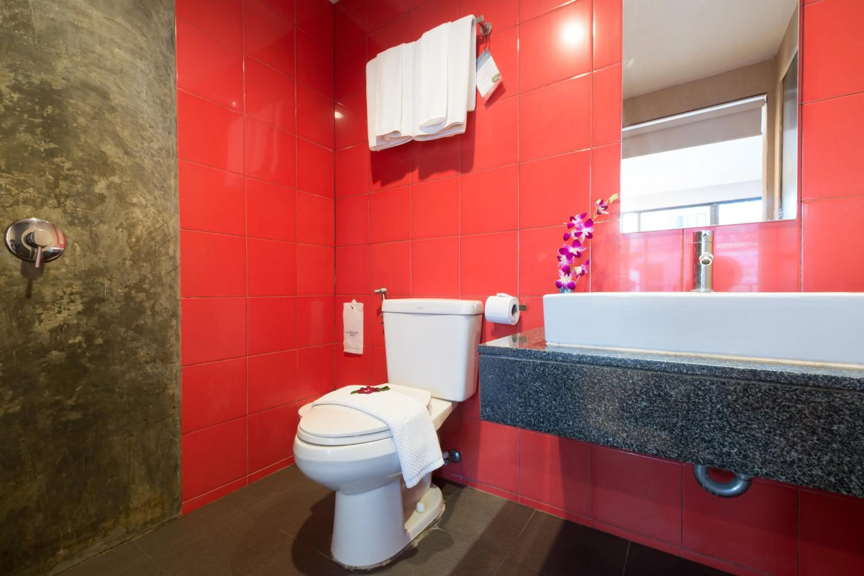 Shower in Alfresco Phuket Hotel