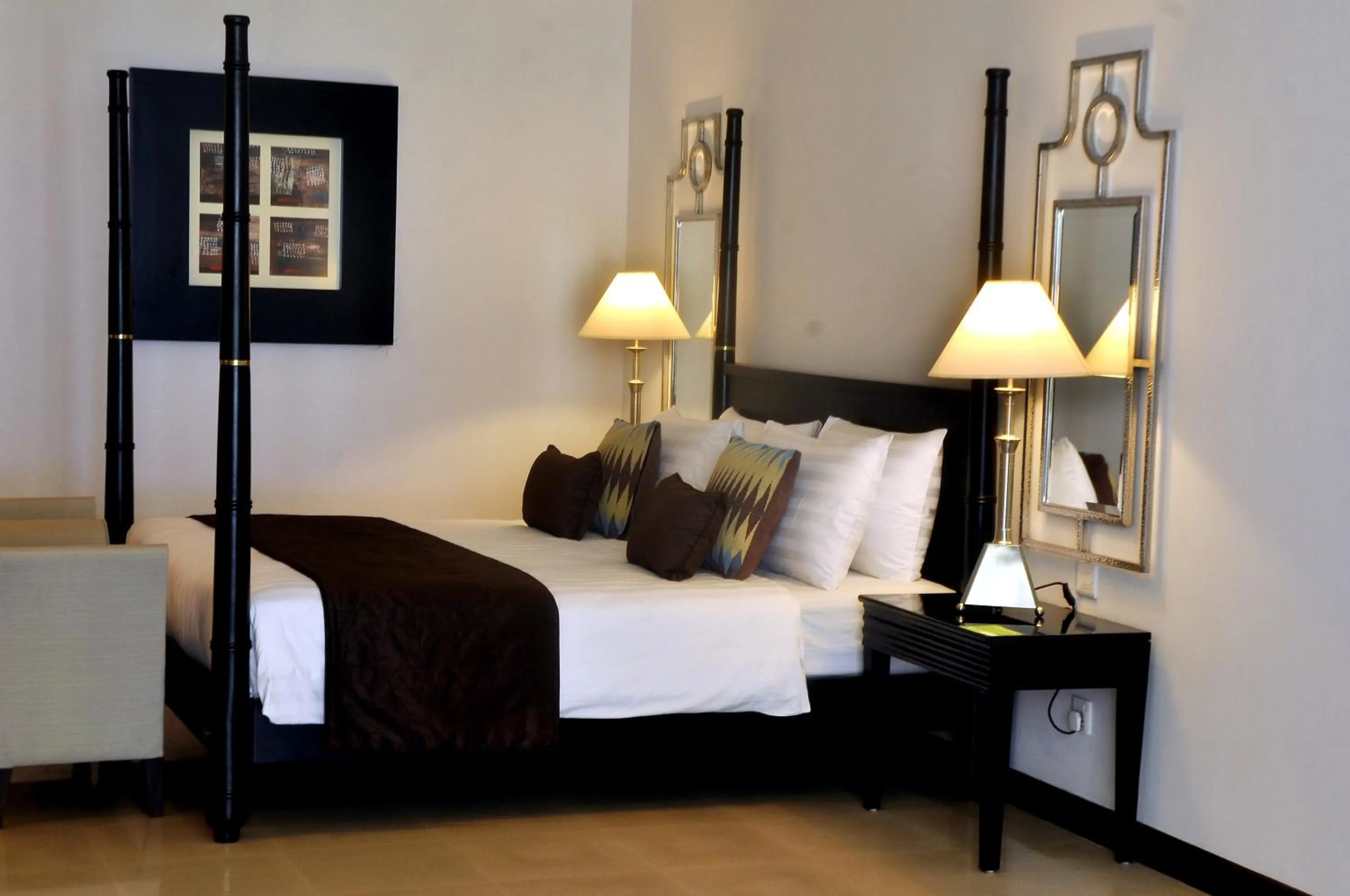 Bed in The Blue Water - Geoffrey Bawa Heritage Resort Hotel