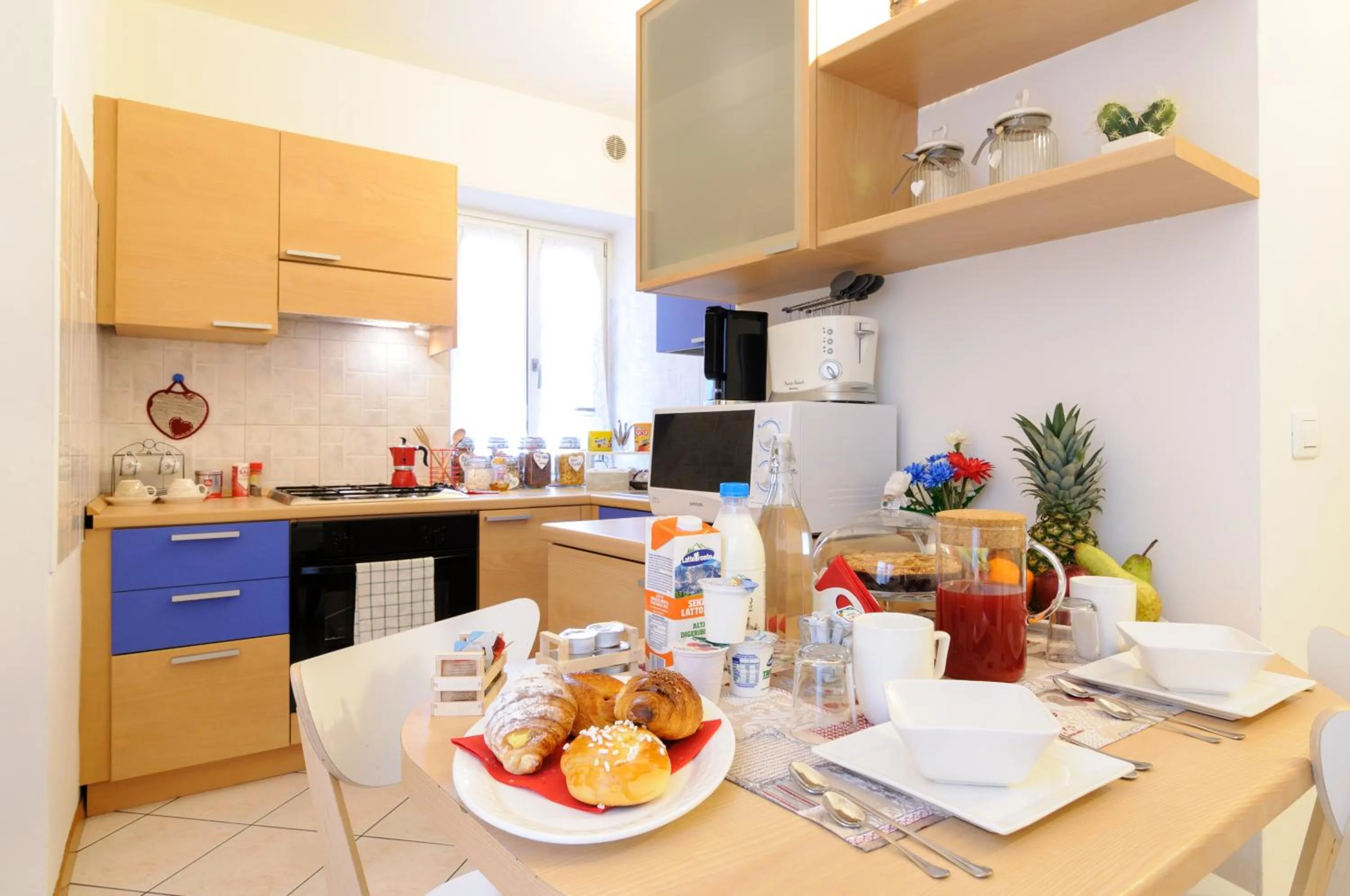 Kitchen or kitchenette in B&B and Apartments Al Duomo