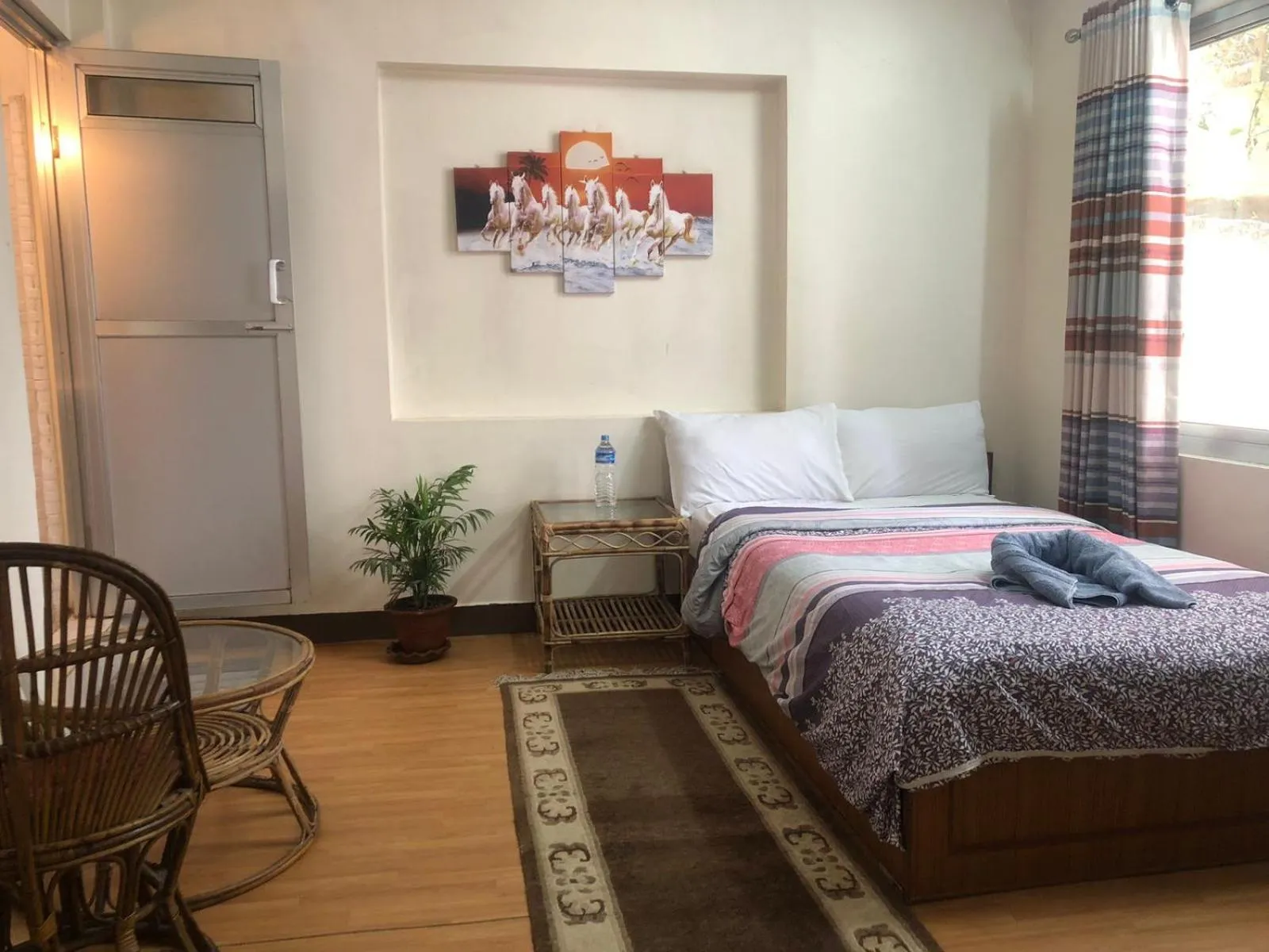 Photo of the whole room, Bed in Green Mandala Inn