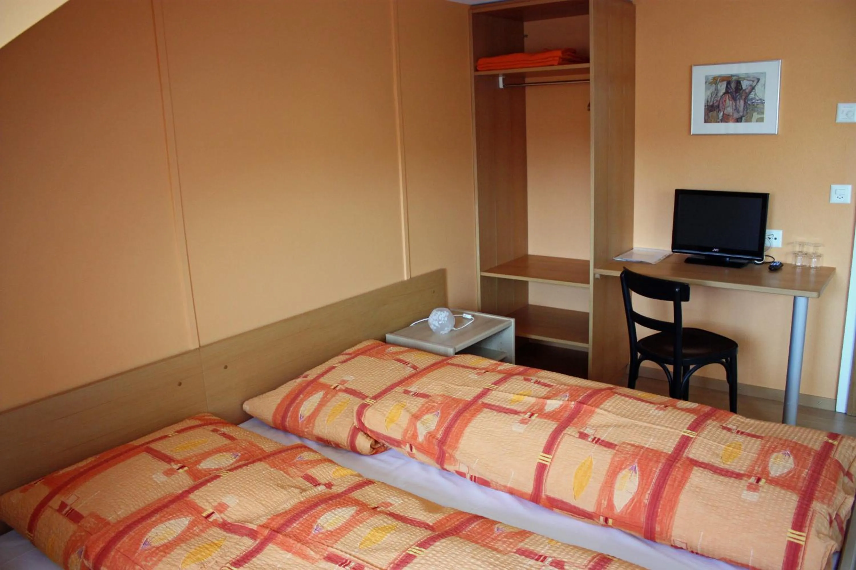 Bed in Hotel Koi-Gartenteich