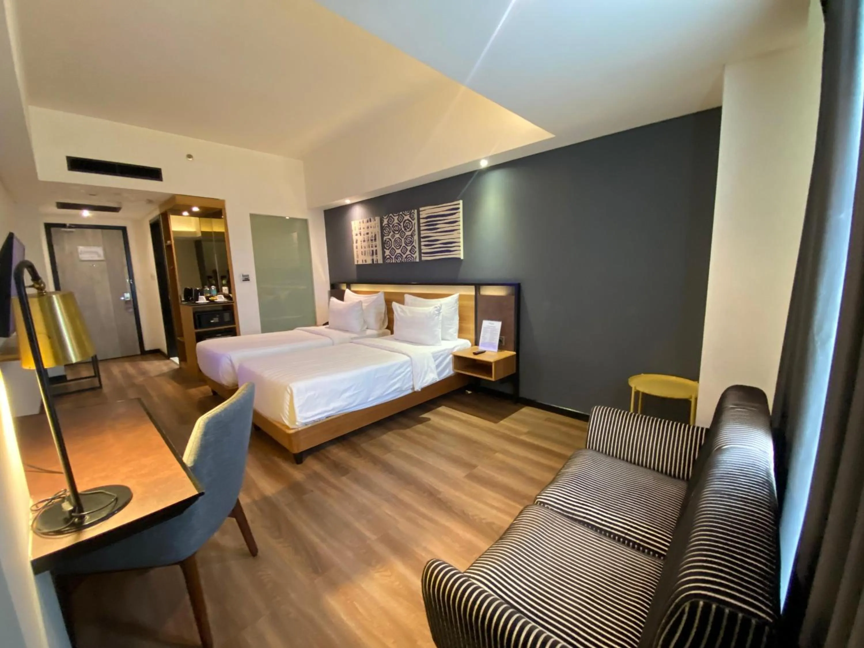 Bed in Muraya Hotel Aceh