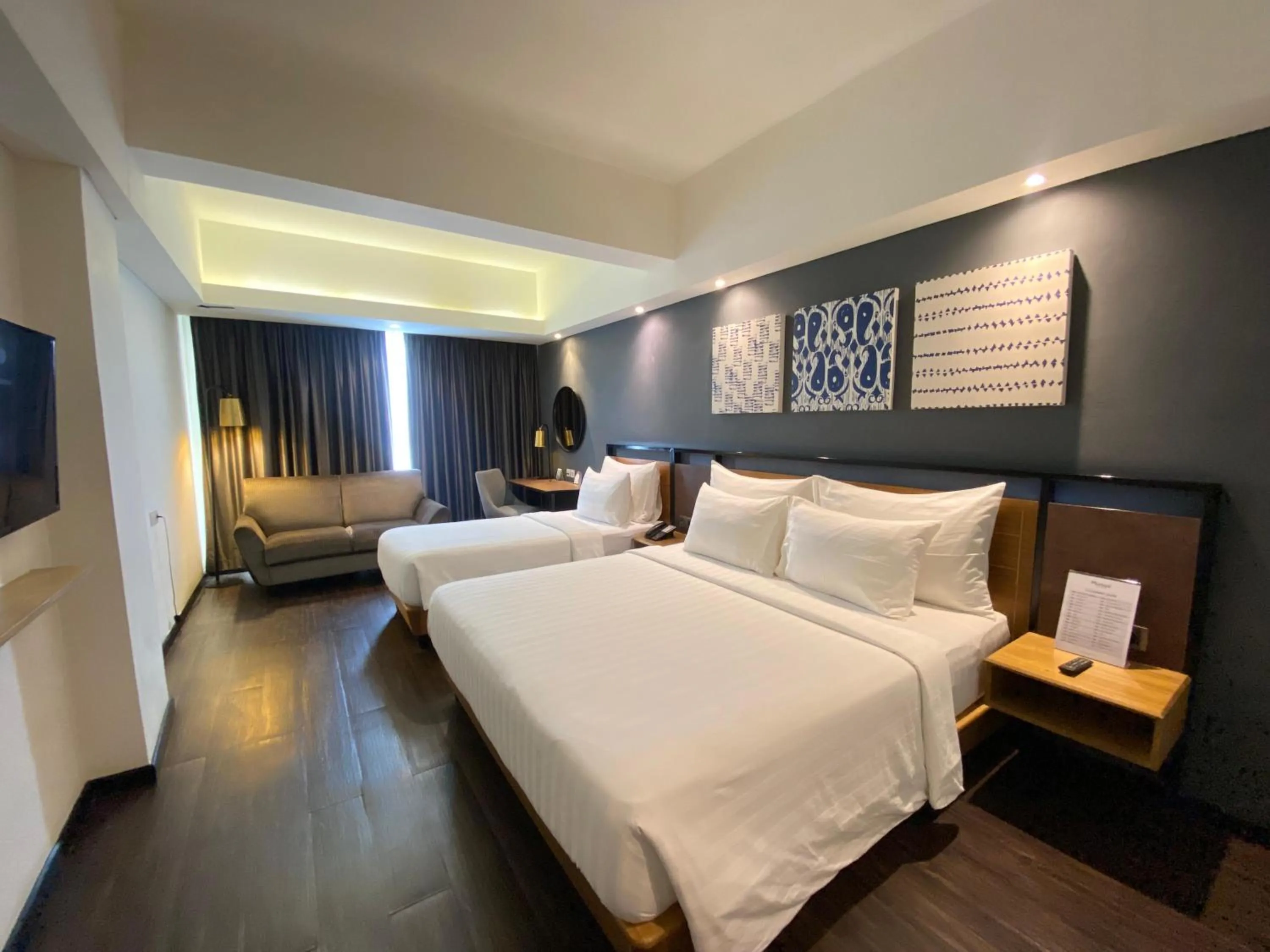 Bed in Muraya Hotel Aceh