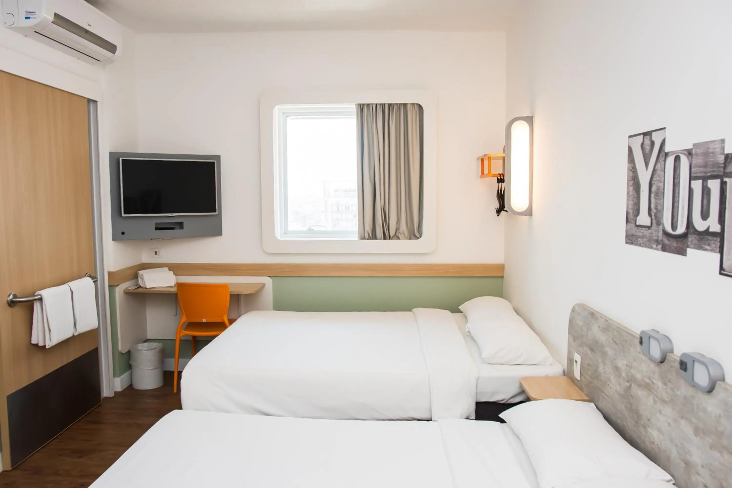 Photo of the whole room, Bed in ibis budget Campinas Aquidaban