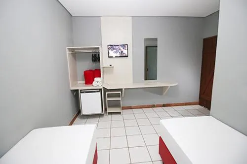 Bed in Hotel Pousada Bonsai