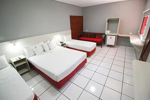 Bed in Hotel Pousada Bonsai