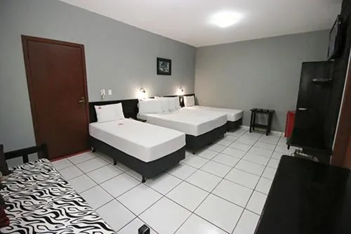 Bed in Hotel Pousada Bonsai