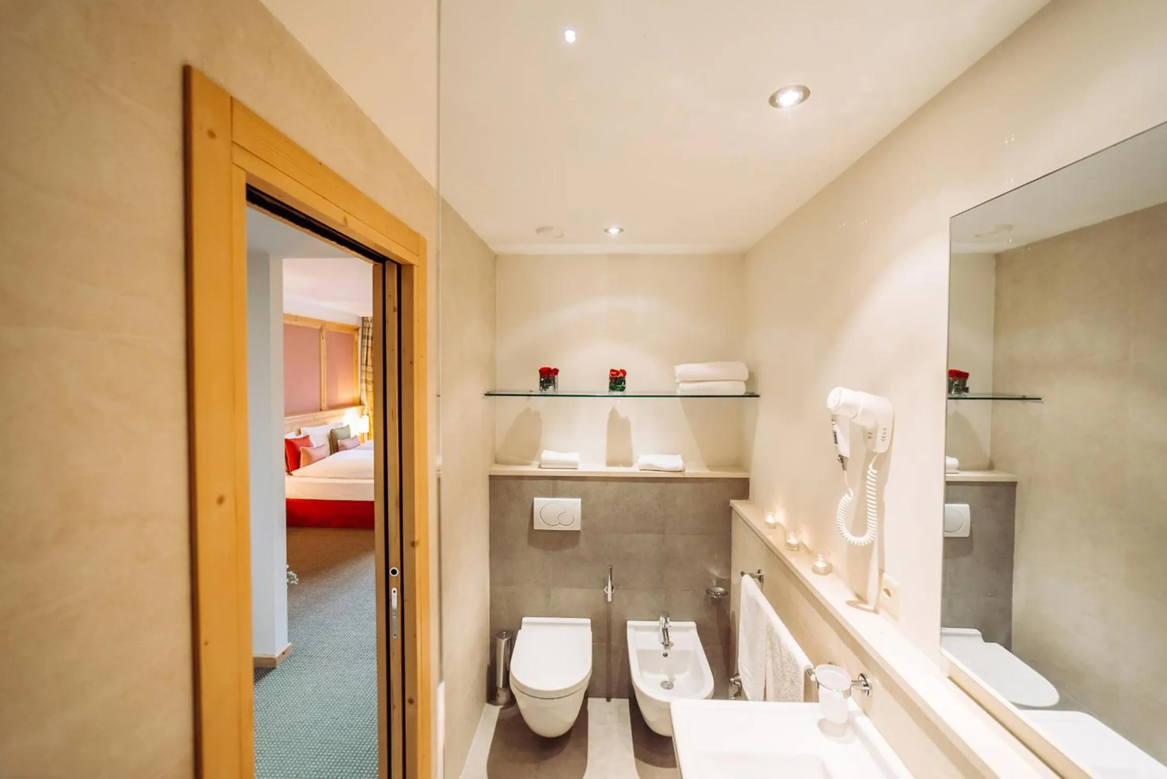 Bathroom, Bed in Schloss Hotel & Spa Pontresina