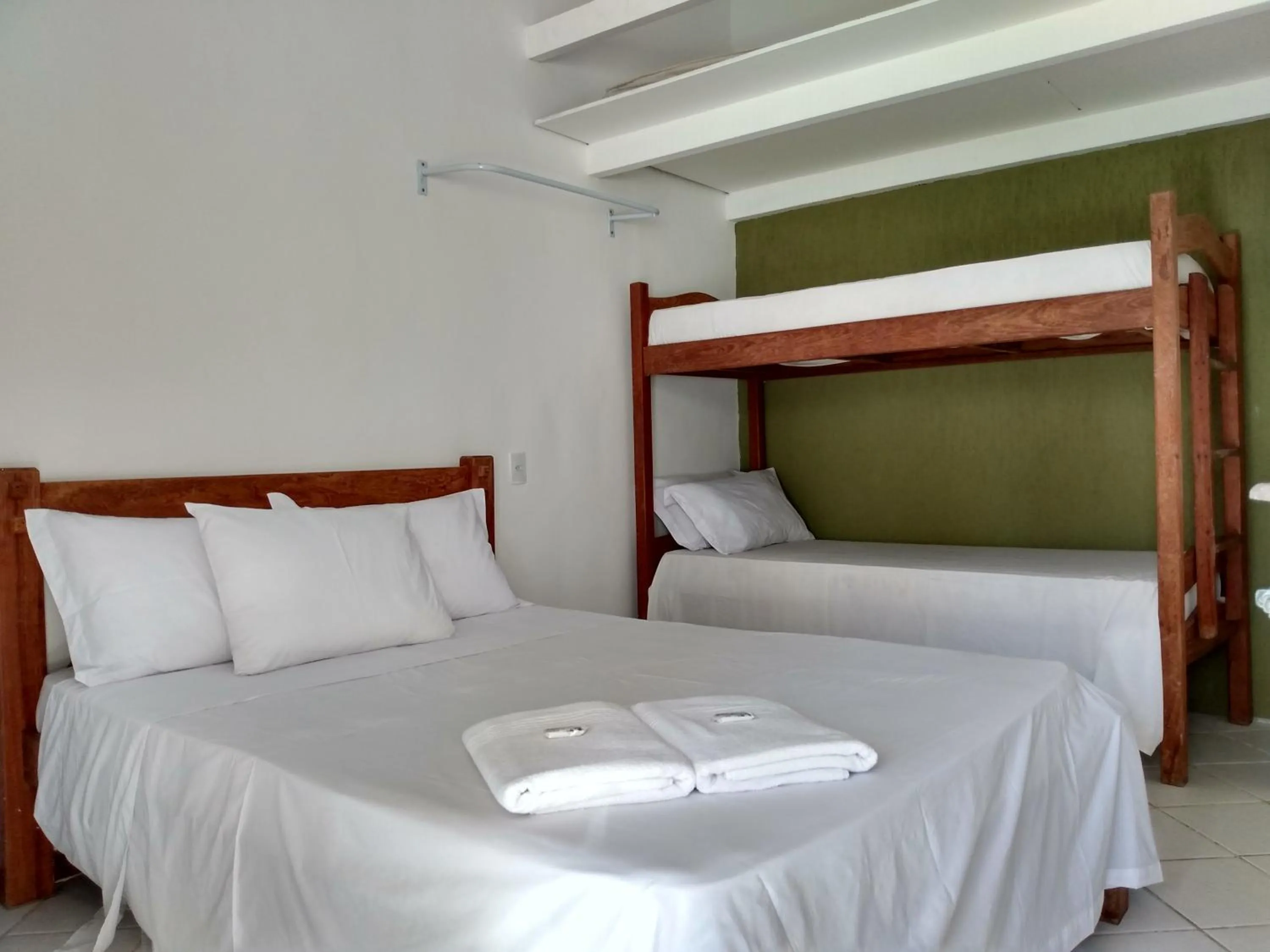 Bed in Pousada Praia do Flamengo