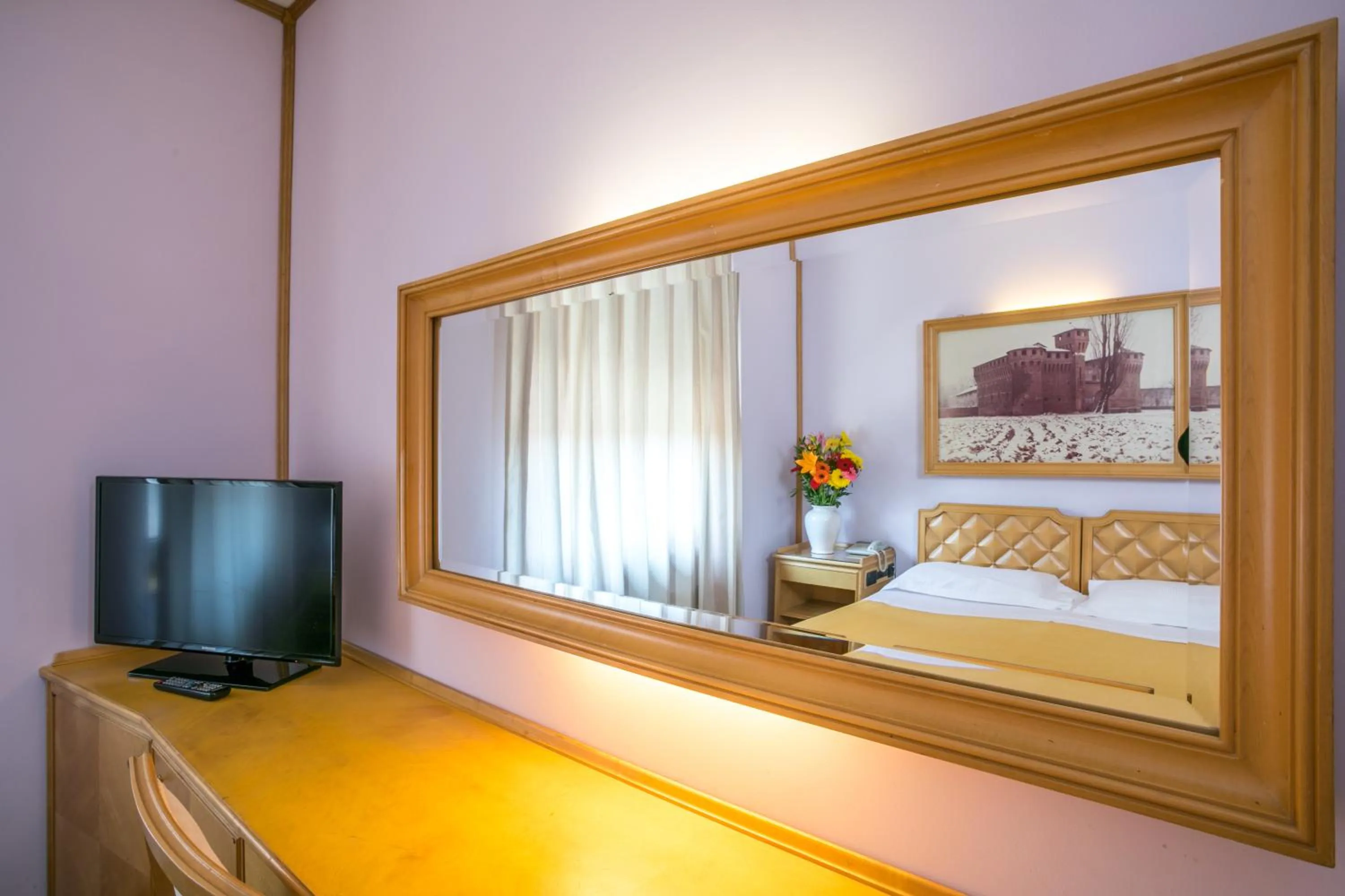 Communal lounge/ TV room in Albergo Italia